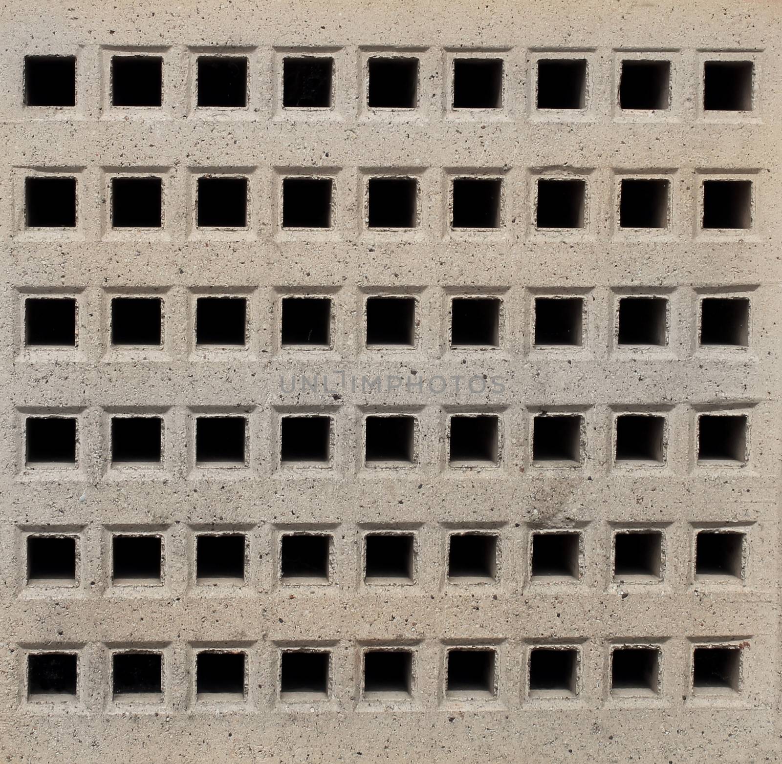 Closeup of an air brick on a modern building.