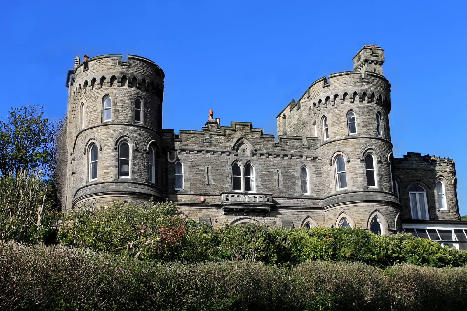 Historic English house with castle turrets, Scarborough, England.