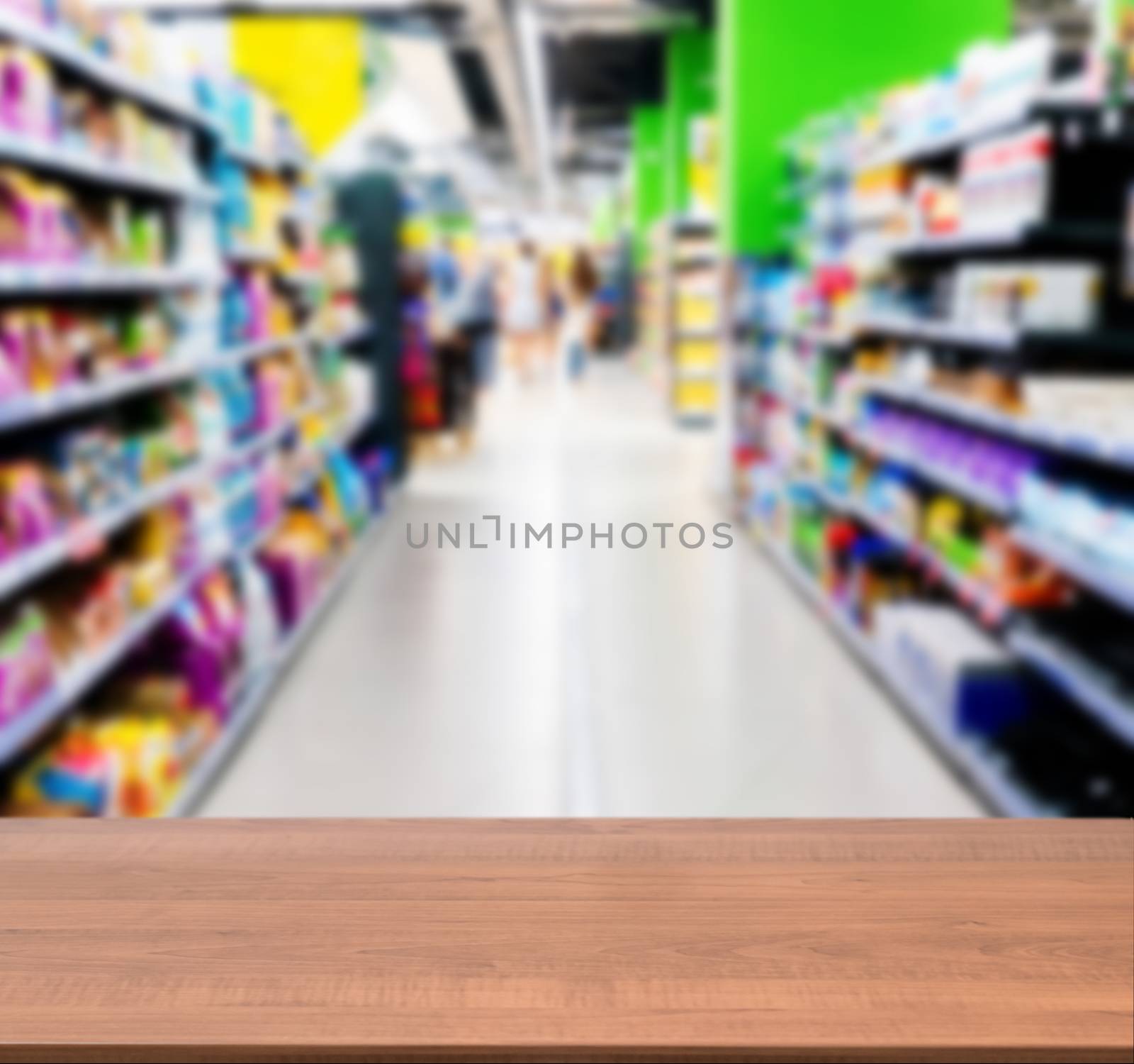 Wooden empty table in front of blurred supermarket by fascinadora