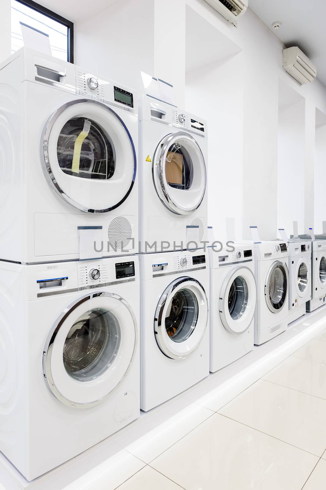 Washing machines, dryer and other domestic appliance equipment in the store