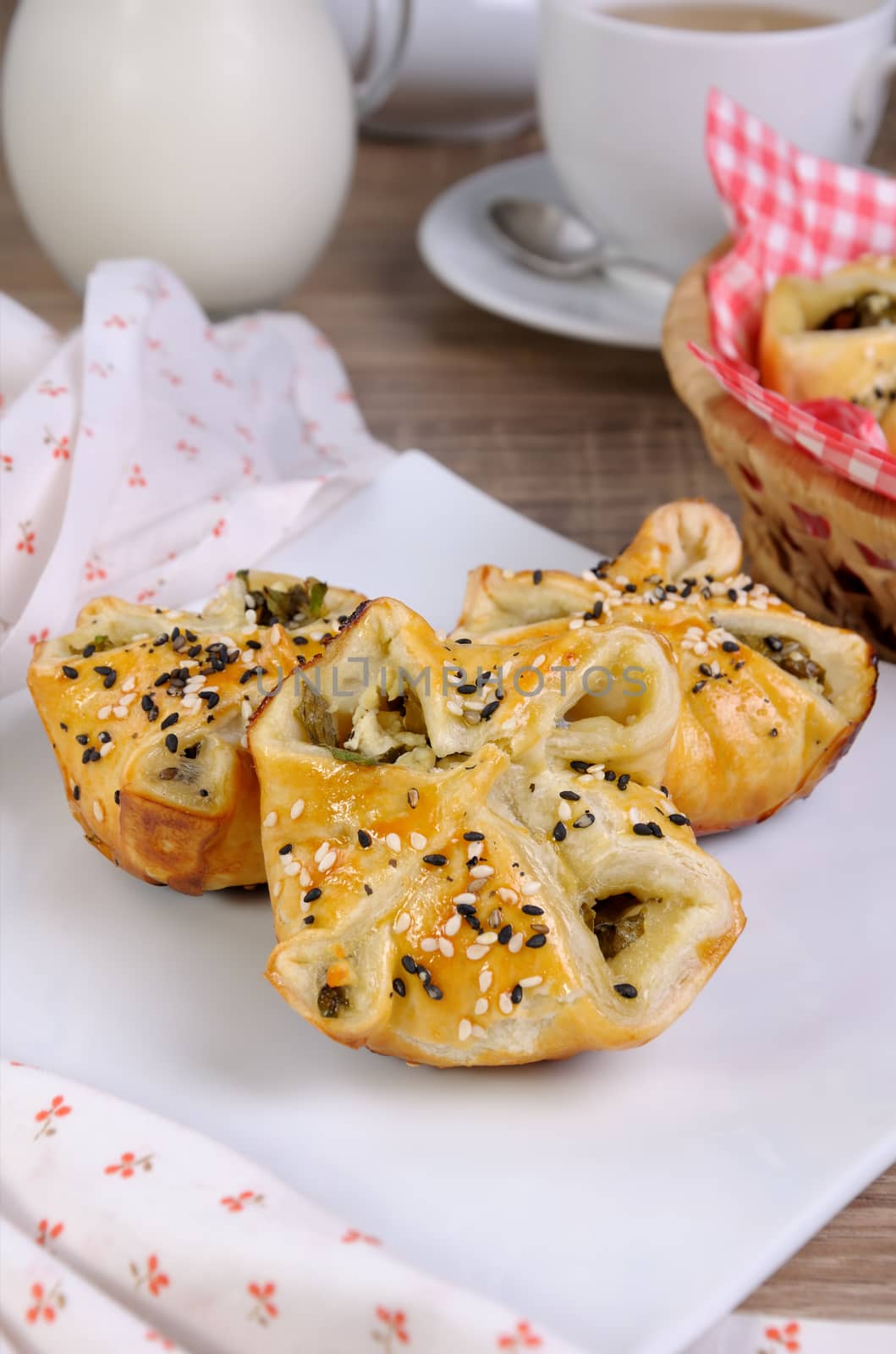  puff pastry with spinach and ricotta in a plate on table