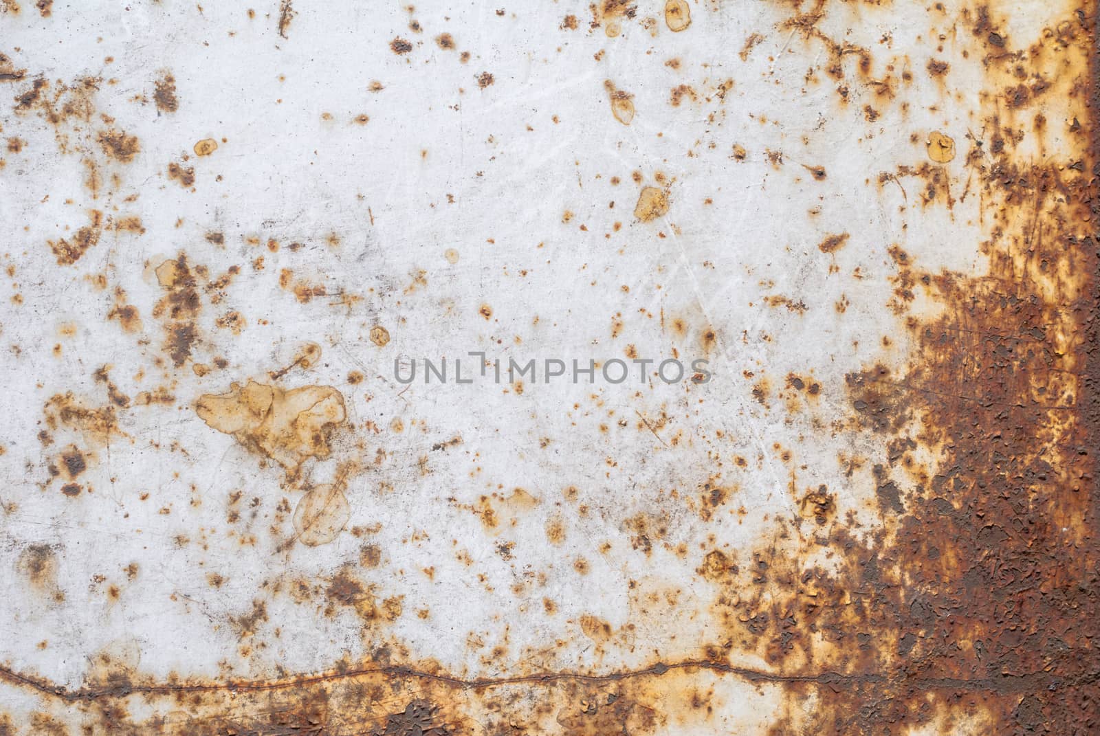 iron surface is covered with old paint, grunge metal surface, great background or texture for your project by uvisni