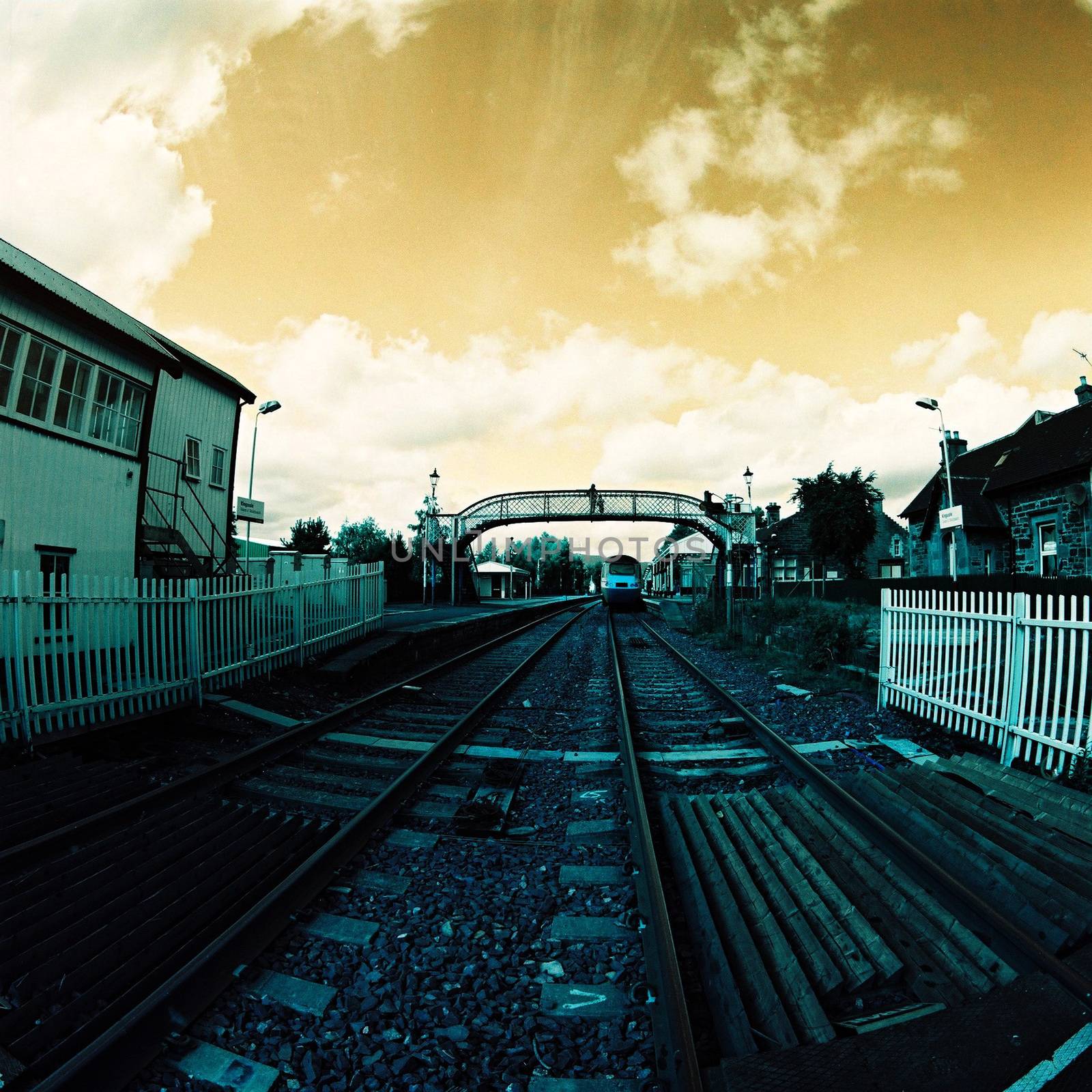Color film image of train station 