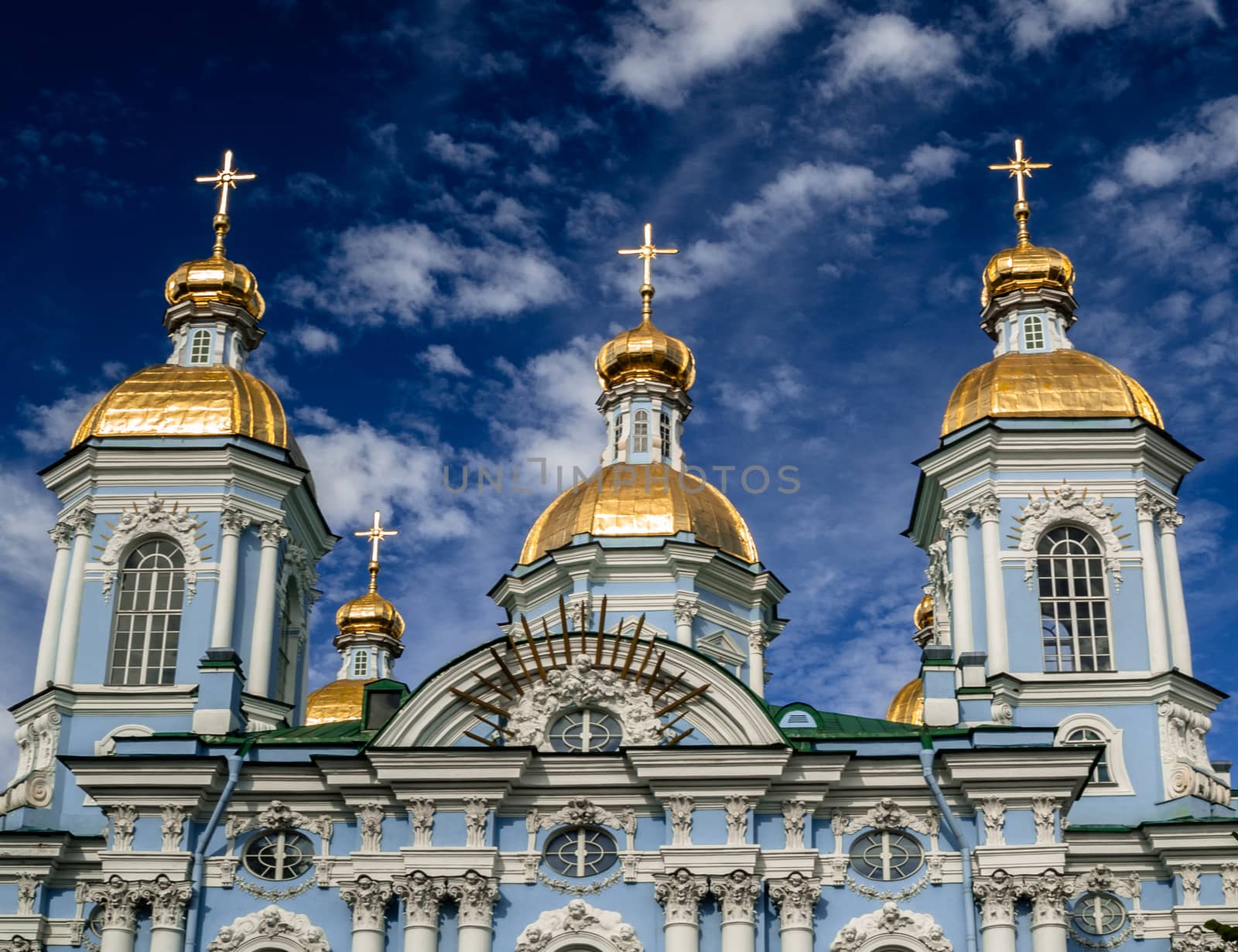 Golden dome of St. Nicholas Cathedral in Saint Petersburg on a clear sunny day