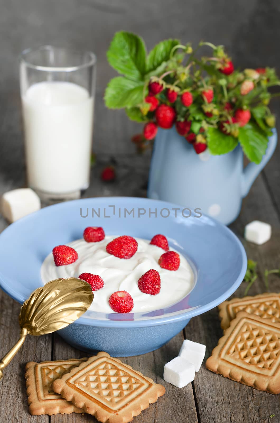 Wild strawberry with cream, cookies and milk, the old rough boards. by Gaina