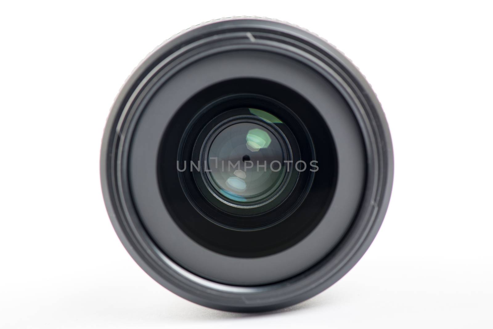 Front close-up of a camera lens on white background