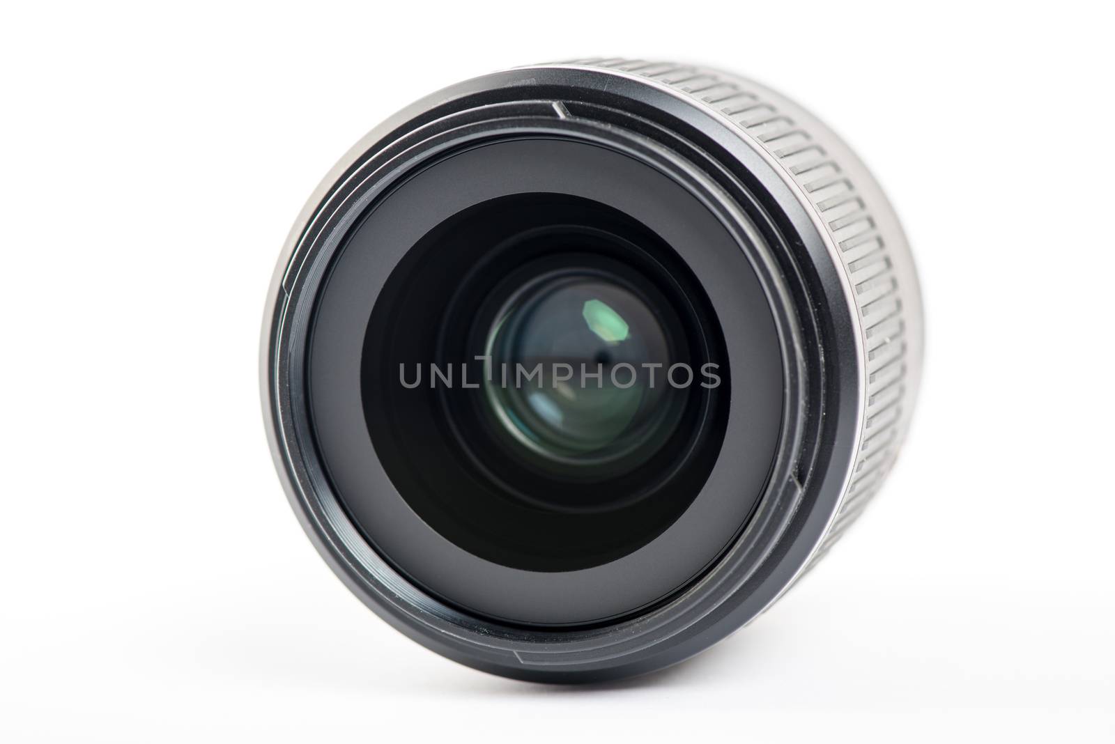 Close-up of a camera lens on white background