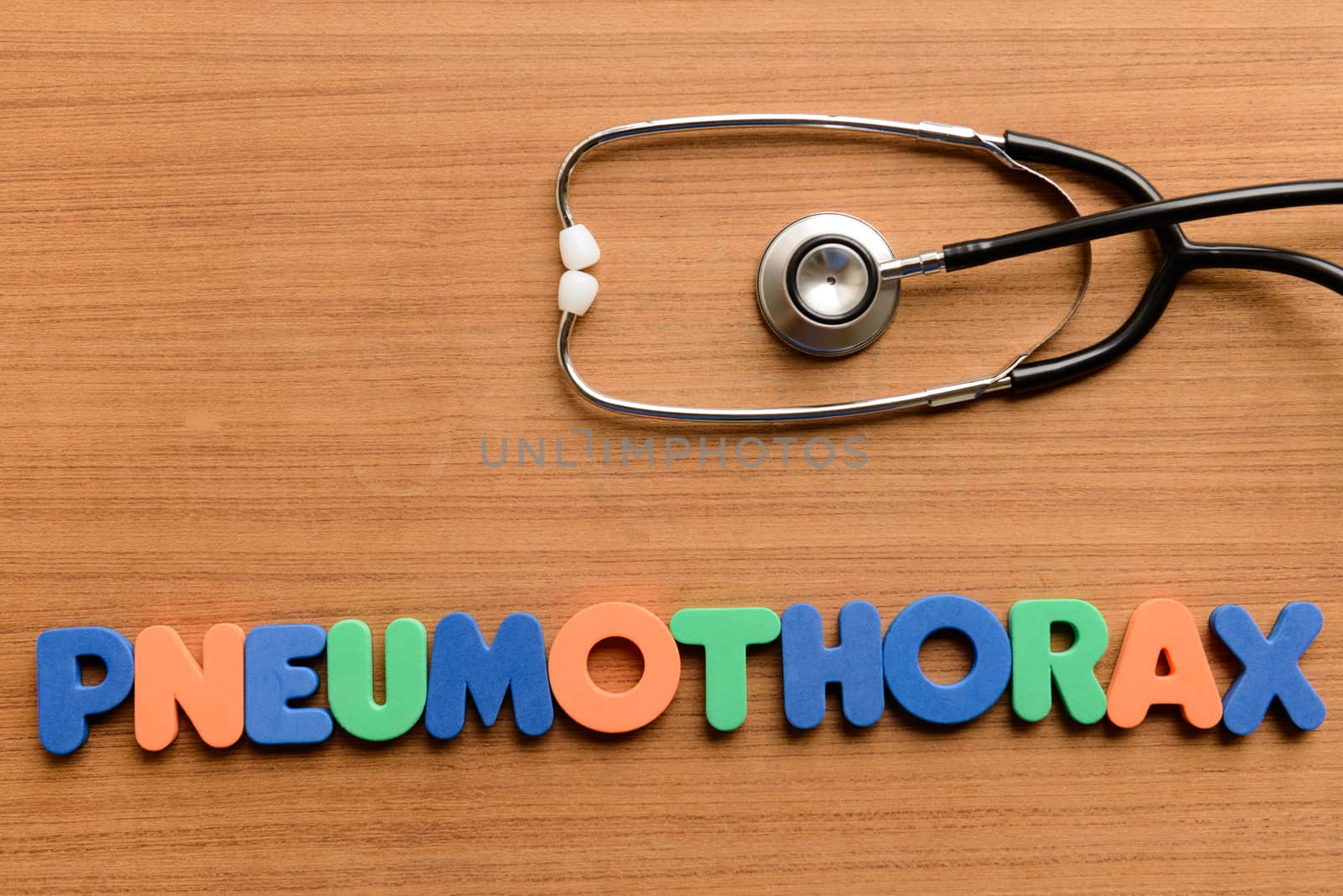 Pneumothorax colorful word on the wooden background