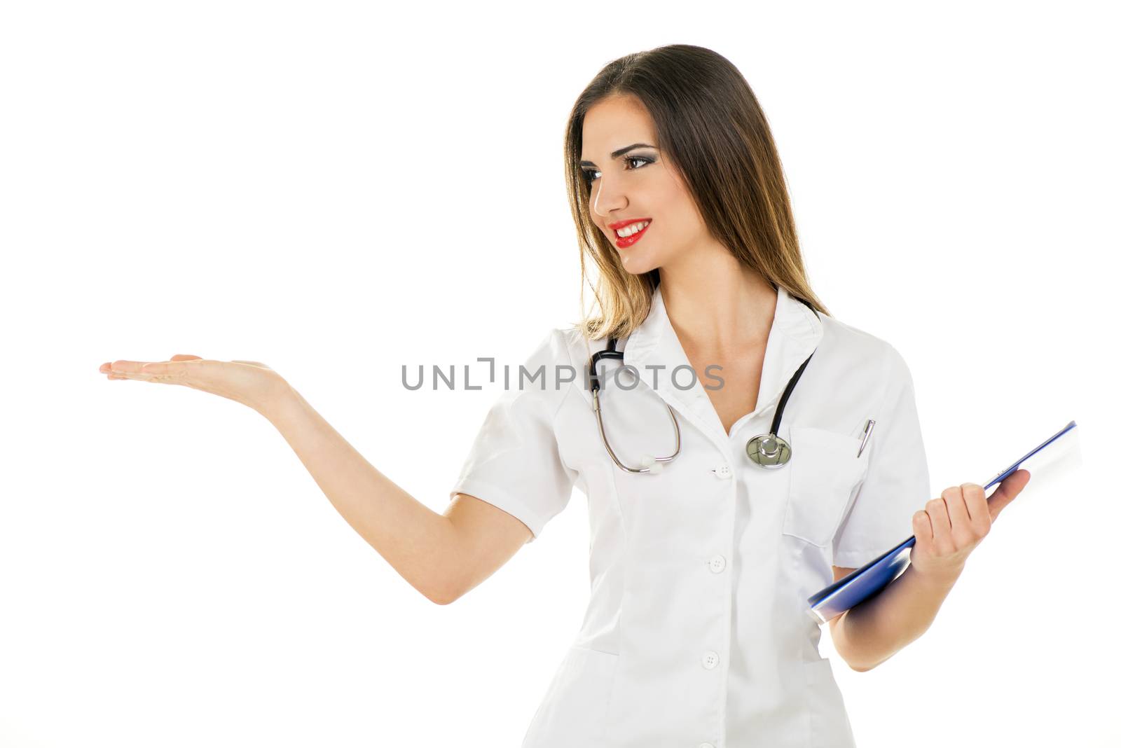 Beautiful smiling nurse standing and posing on white background.