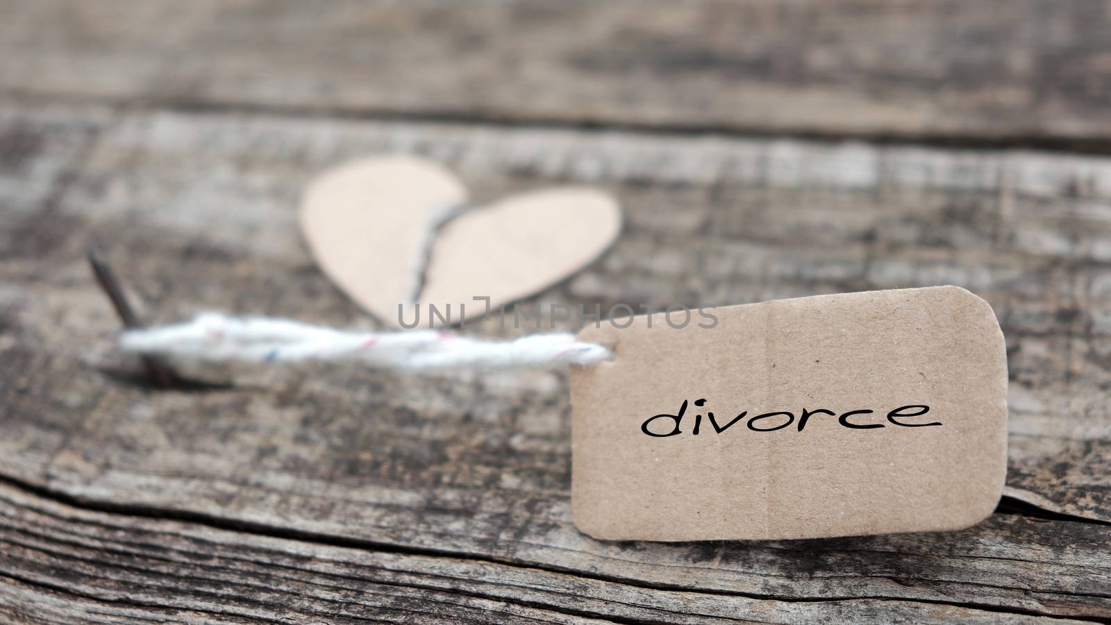 Divorce background with broken heart and message on wooden, unhappy marriage and adultery problem make stress life, society issue in modern lifestyle