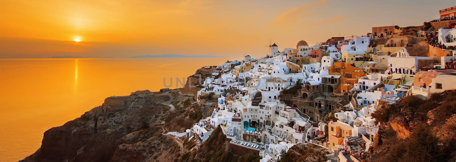Oia at sunset, panoramic view by vwalakte