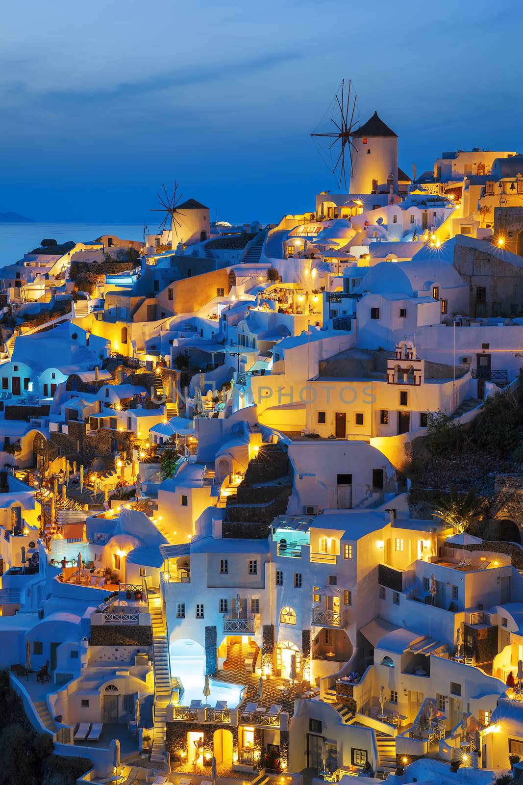 Lights of Oia village at night by vwalakte