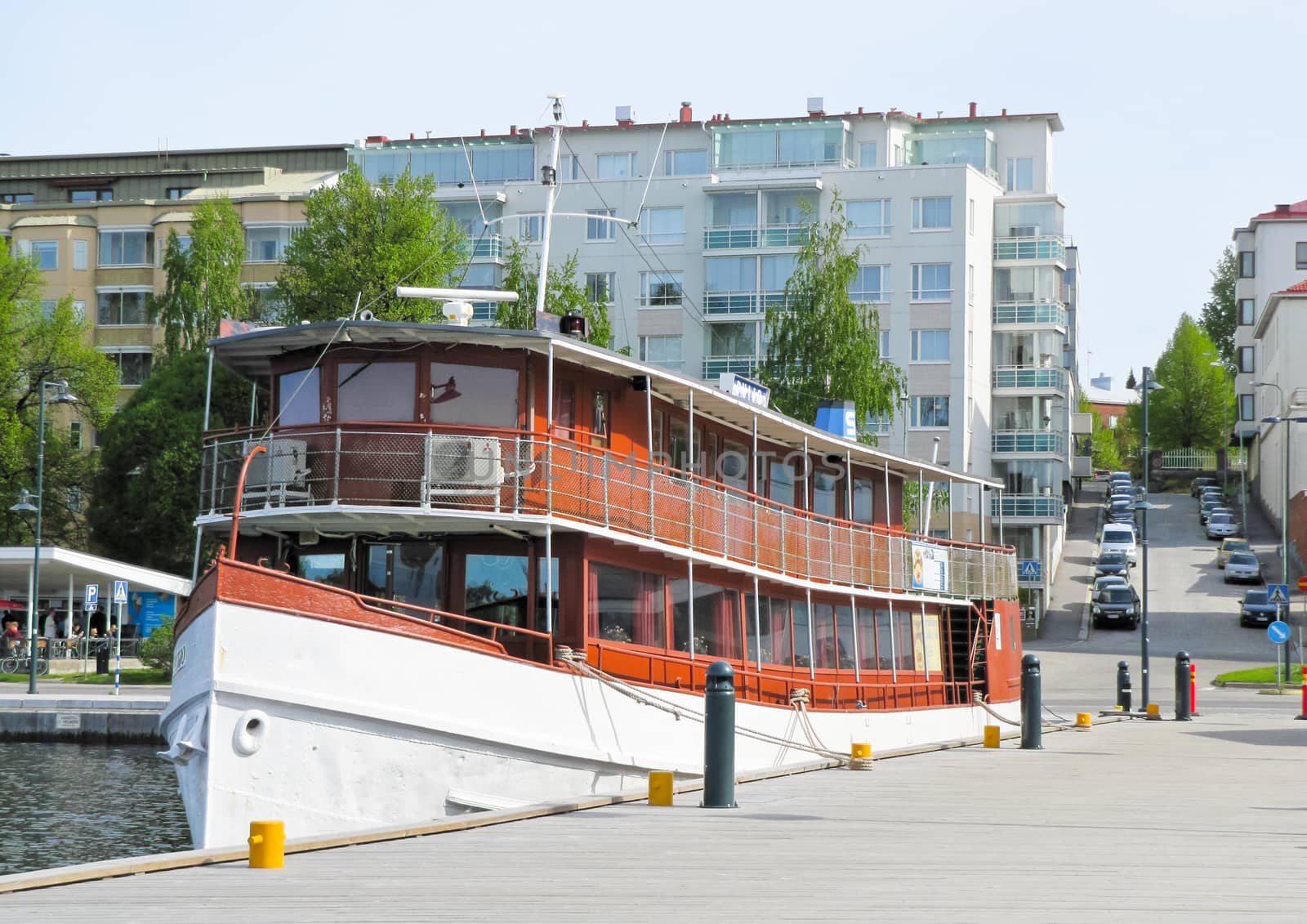 the ship berthed on the background of the urban landscape