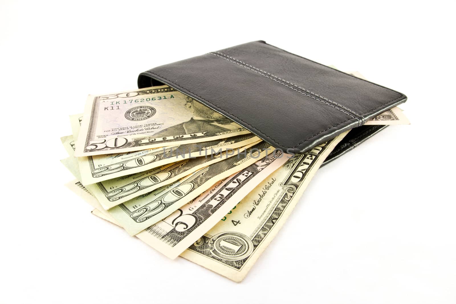 dollars in wallet, isolated on white background