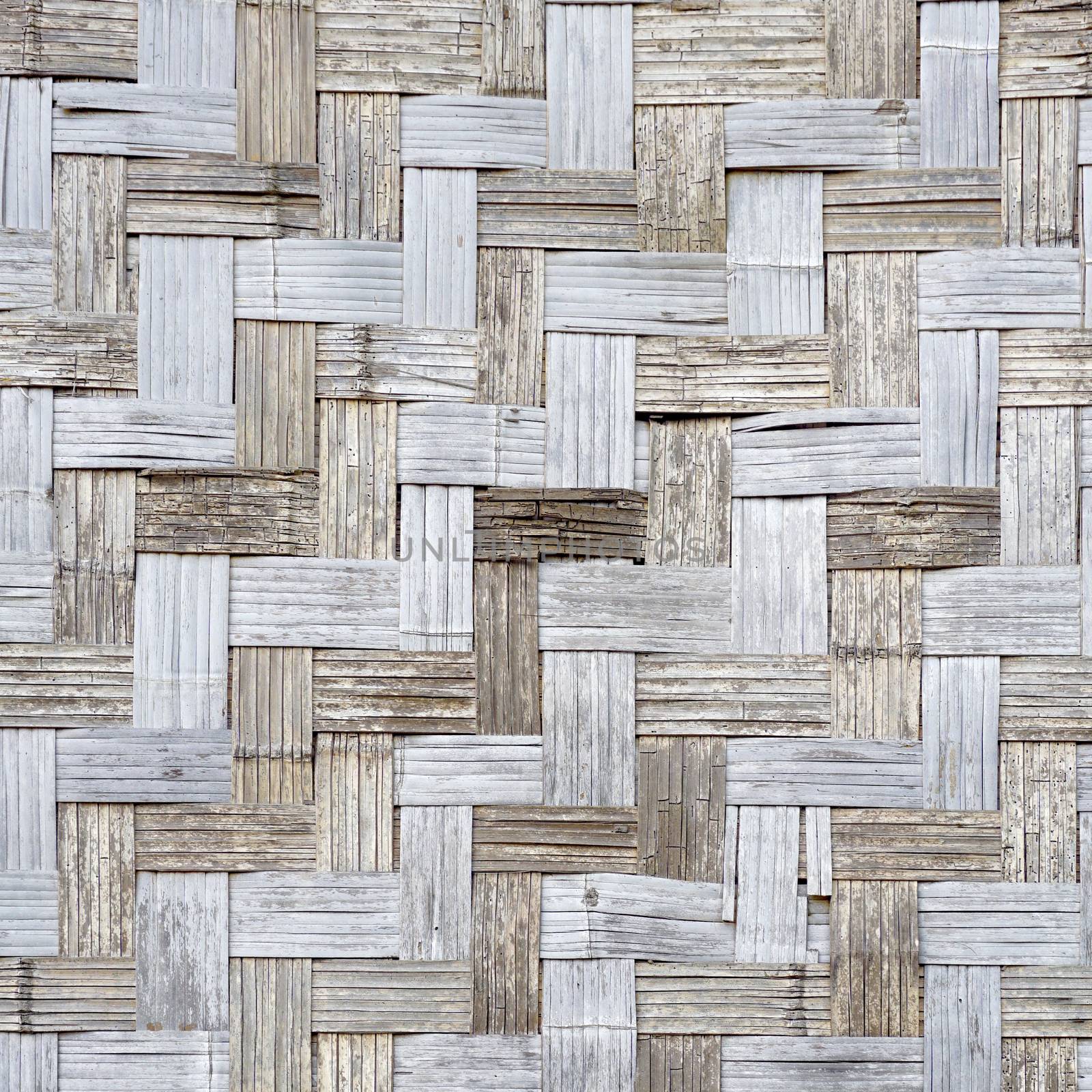 Wall of plaited bamboo strips square vernecular outdoor in Laos