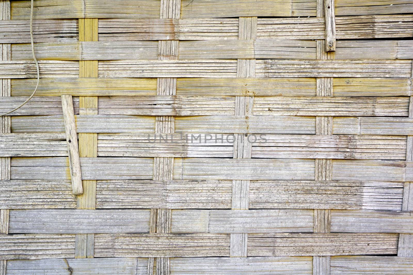 Woven bamboo strips wall vernecular outdoor in Laos