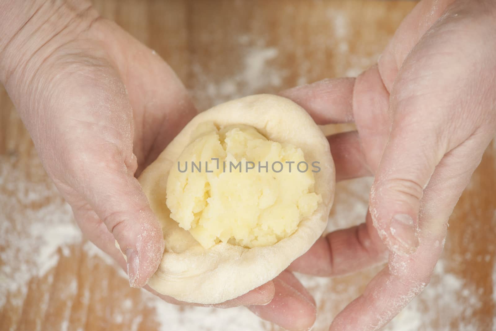 Several small patties with the potato filling