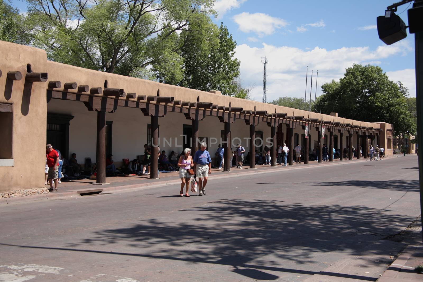 Shoppers and tourists at the Native American market in the Palace of the Governors.