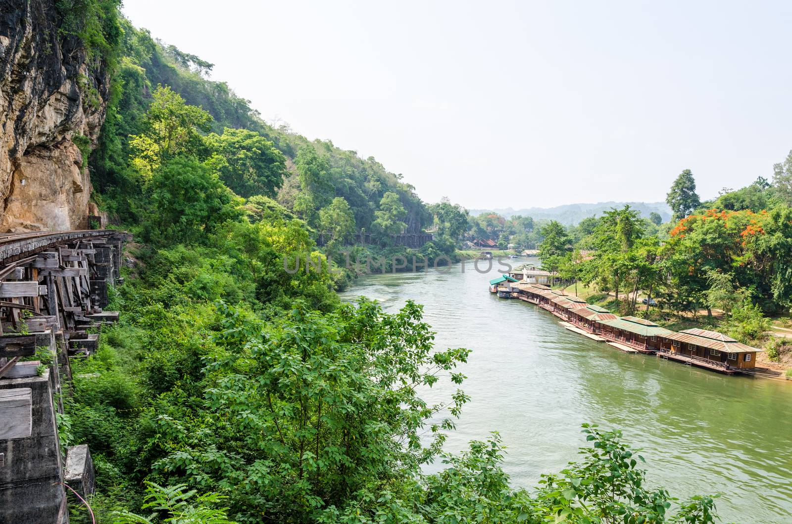 Beautiful landscape Kwai Noi river under Death Railway bridge and floating resort at Krasae cave in Kanchanaburi province Thailand