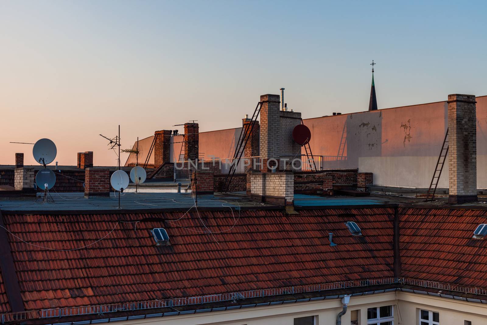 Roofs of townhouses (row houses) in Europe in the afternoon