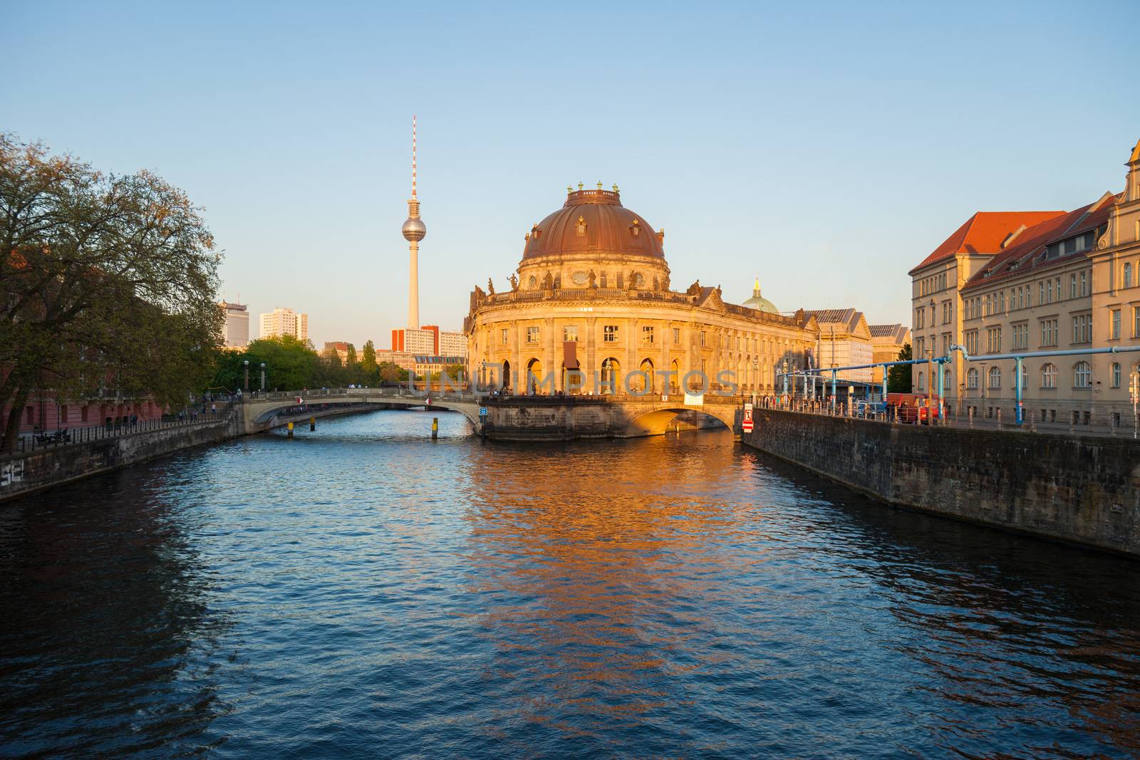 Berlin River Spree and famous round Bode Museum at twilight with TV Tower (Fernsehturm)