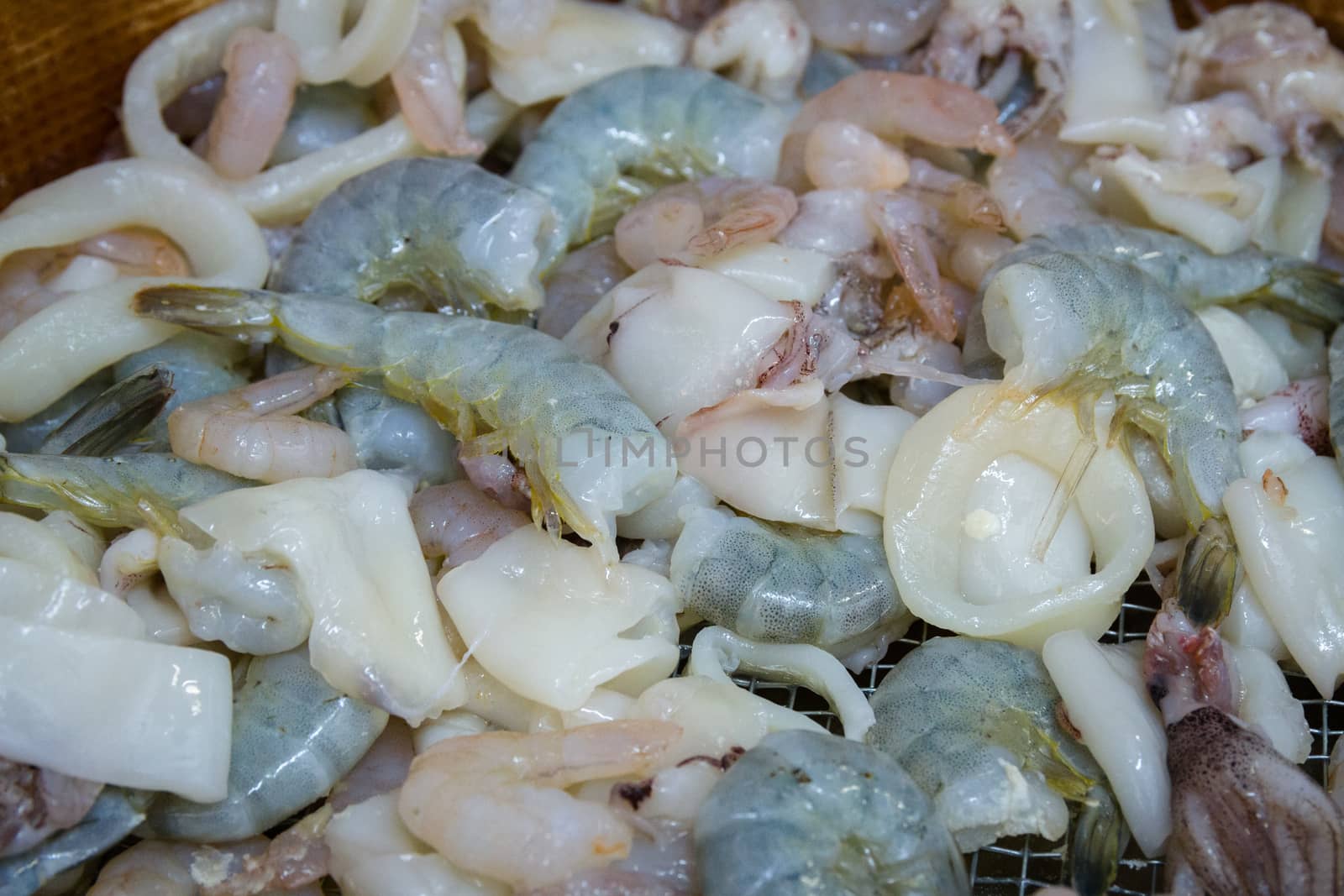 mixed fried fish, with squid, blue fish, chips and lemon