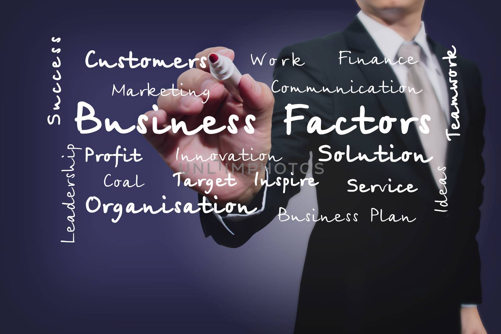 businessman with pen writing on the screen.Business Factors

