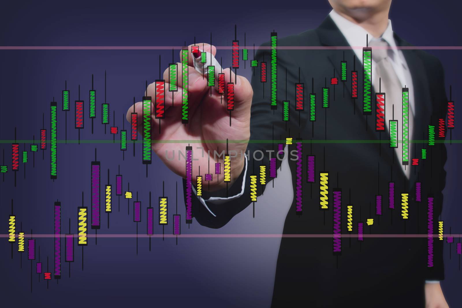  businessman drawing a stock  graph 
