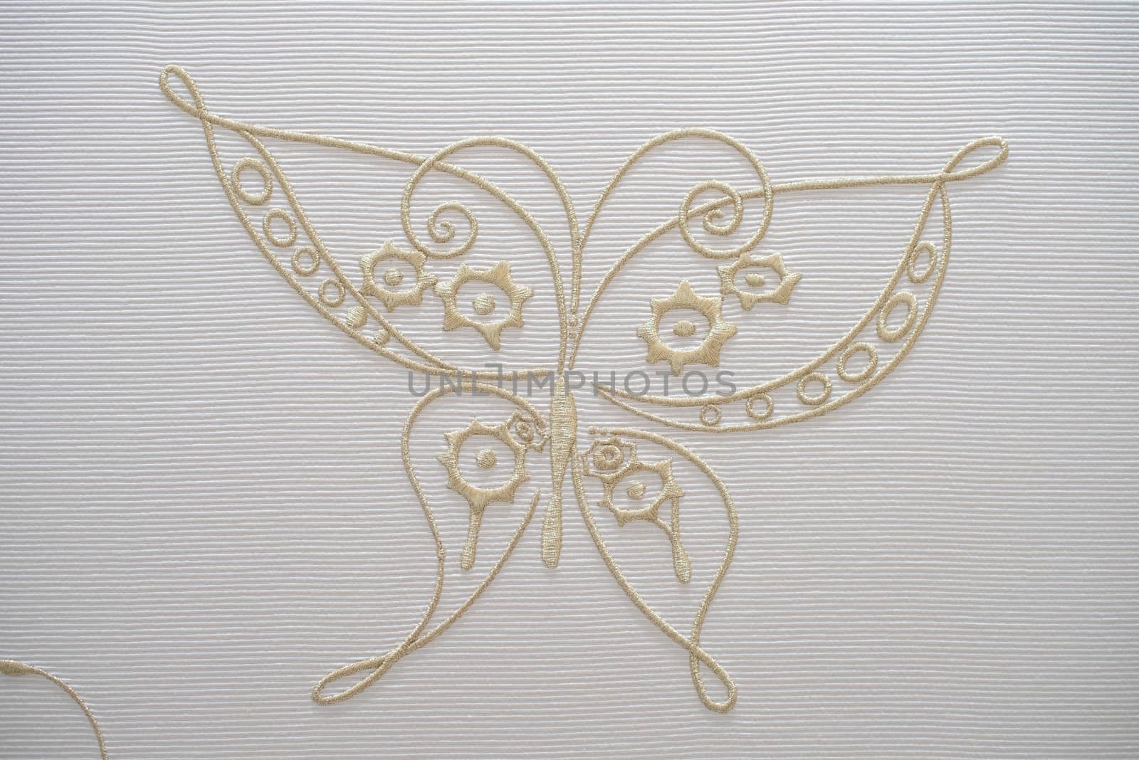 Embroidery butterfly on cotton background