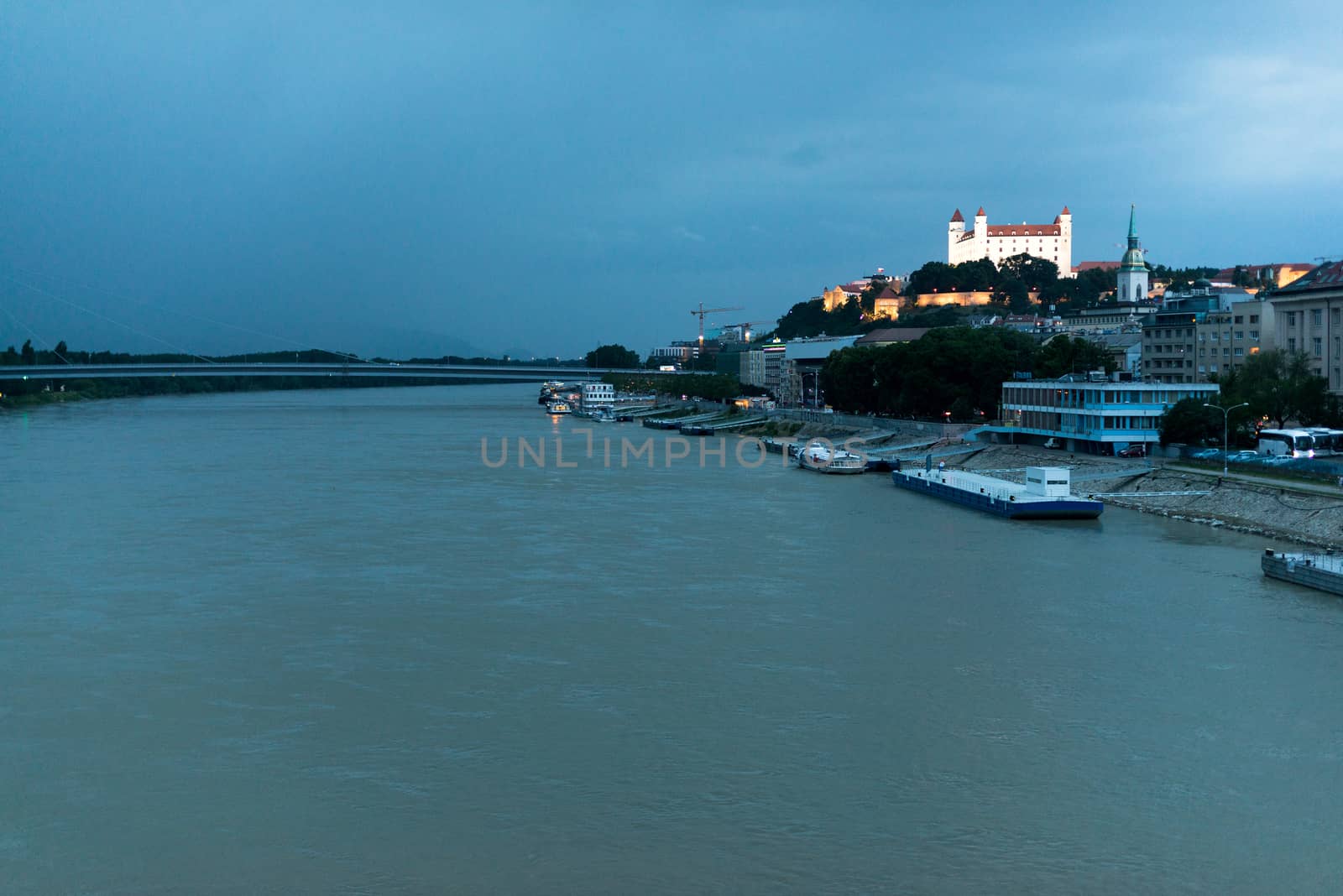 Bratislava castle above Danube river at dusk, Slovakia