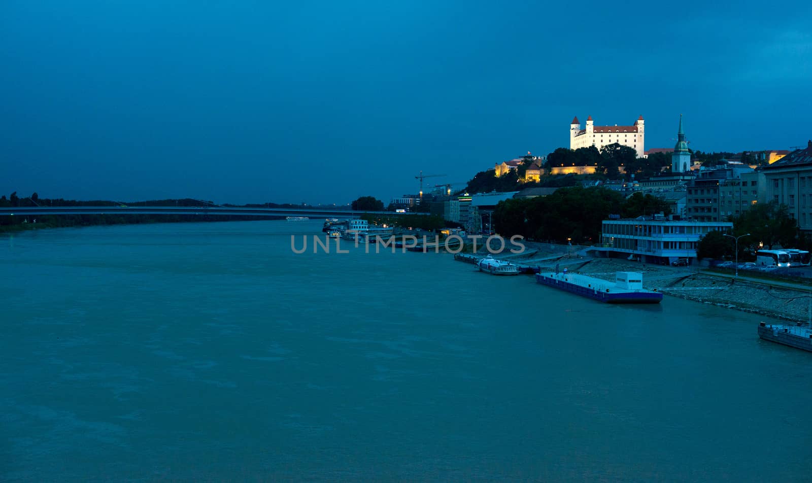 Bratislava castle above Danube river at dusk, Slovakia