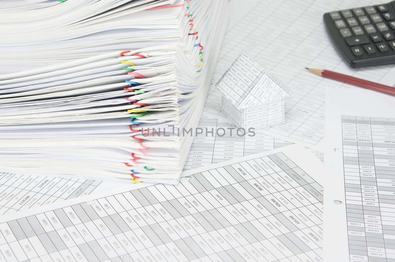 Pile paperwork of report with colorful paperclip on finance account by eaglesky