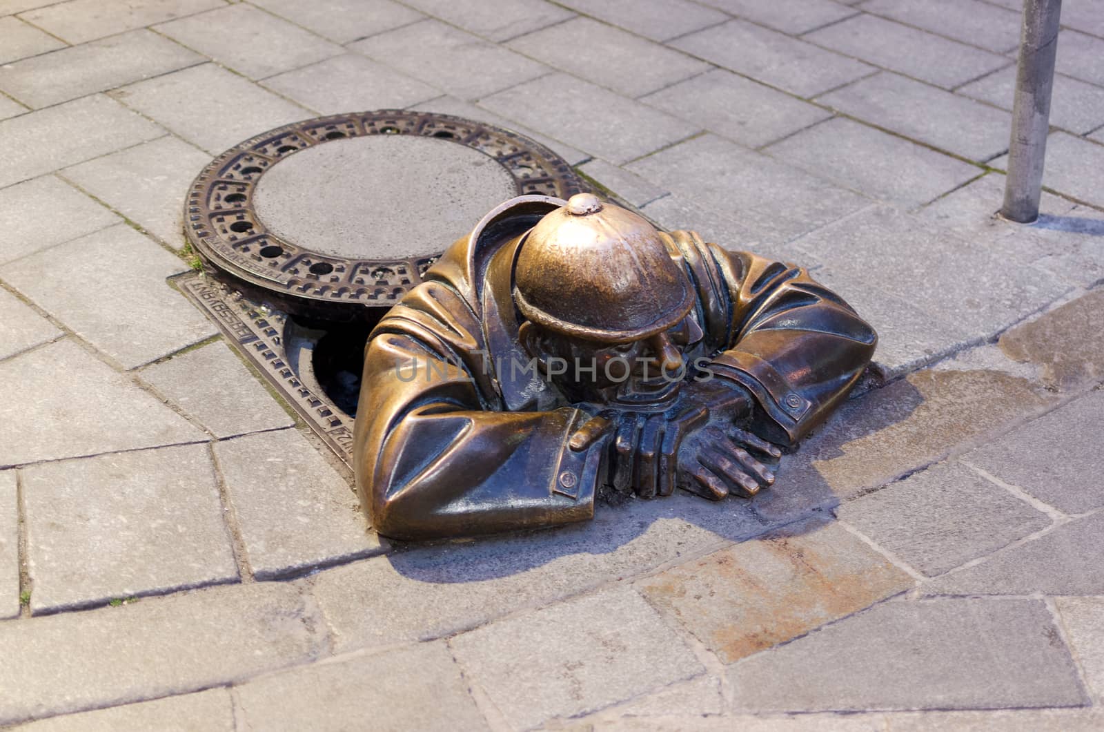 bronze sculpture called man at work, Bratislava, Slovakia by DNKSTUDIO