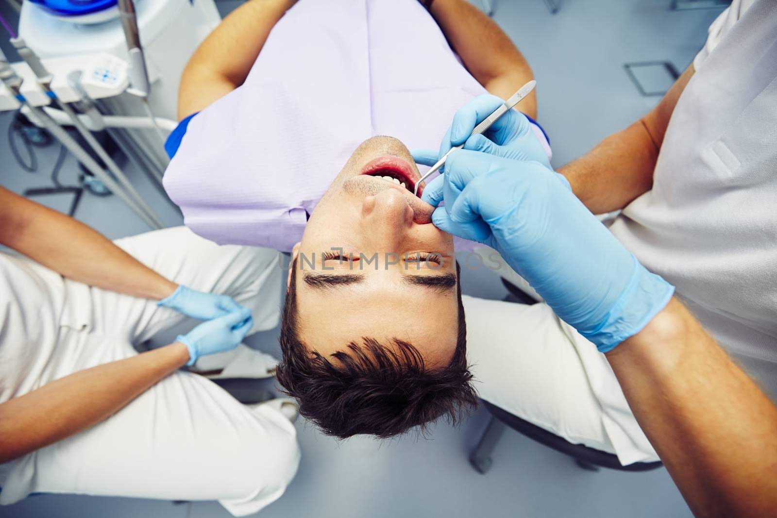 Dentist office - young man in the dentist chair