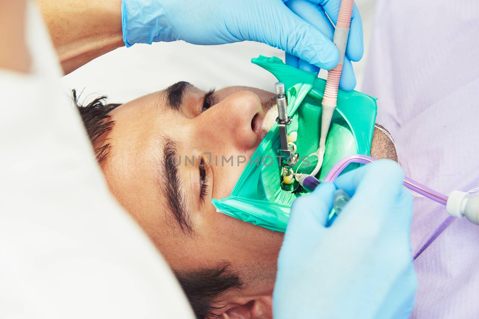 Dentist office - young man in the dentist chair