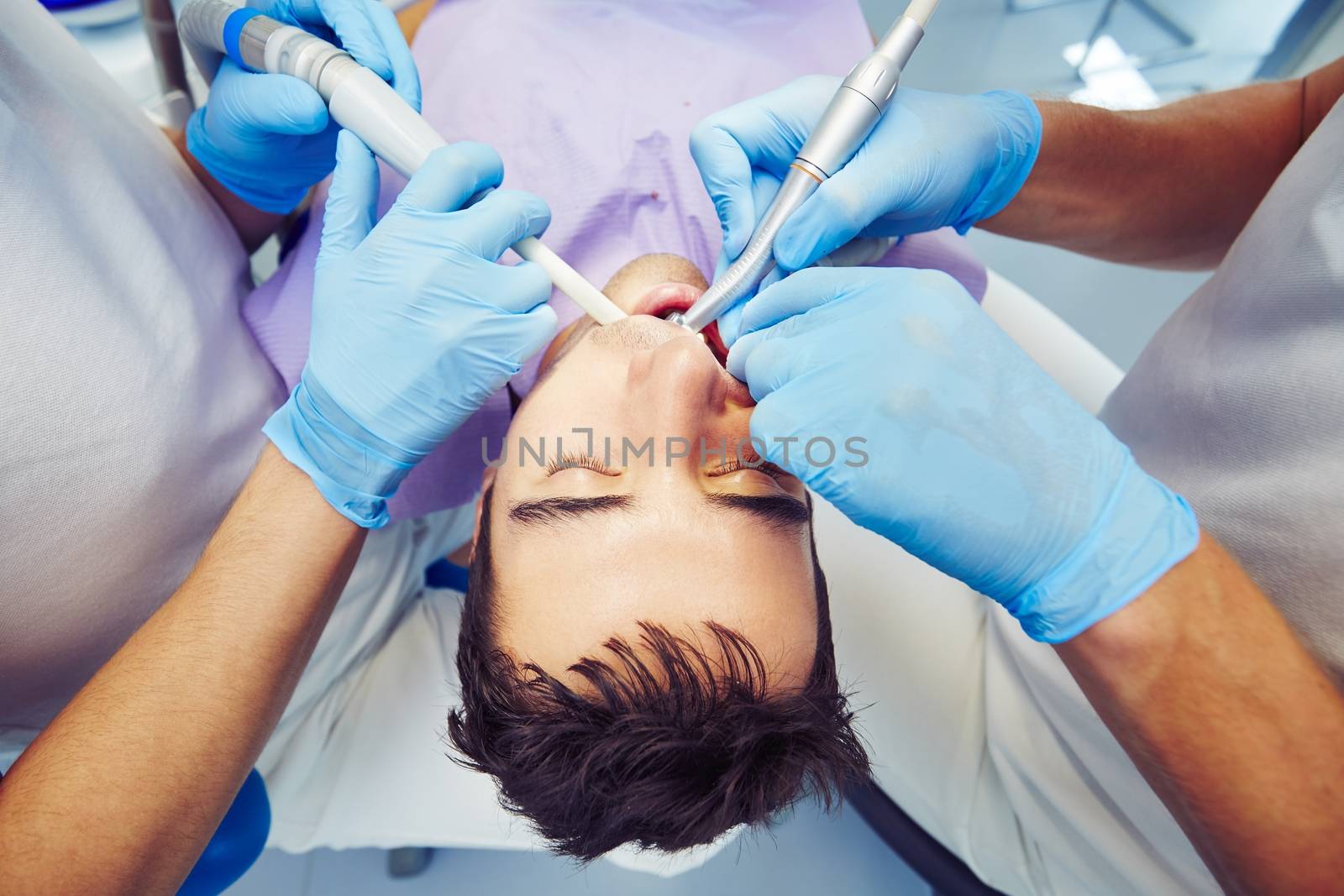 Dentist office - young man in the dentist chair
