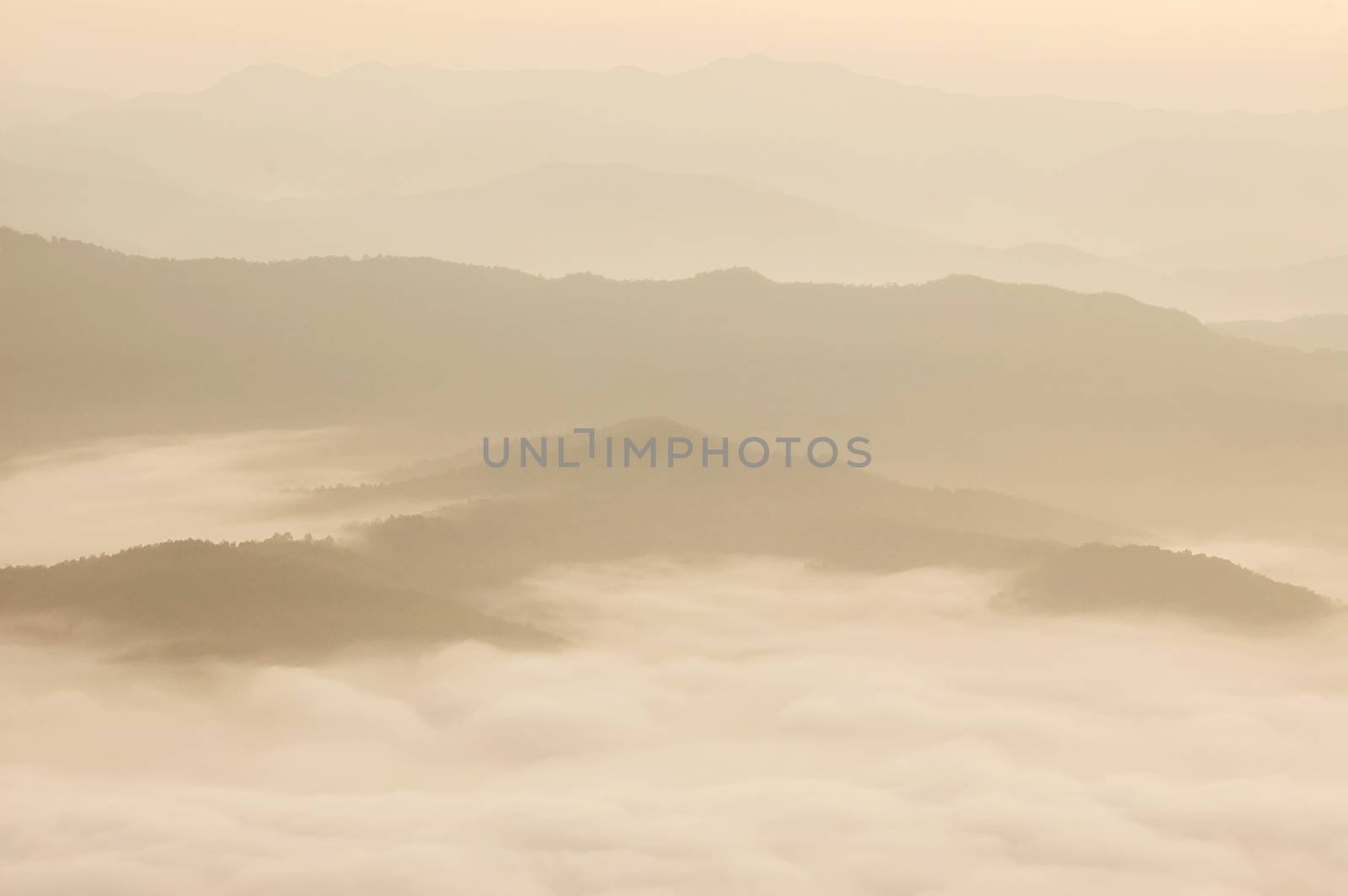 Beautiful morning with fog between hills at Doi Samer Dao in Si Nan National Park , High mountain in Nan province, Thailand