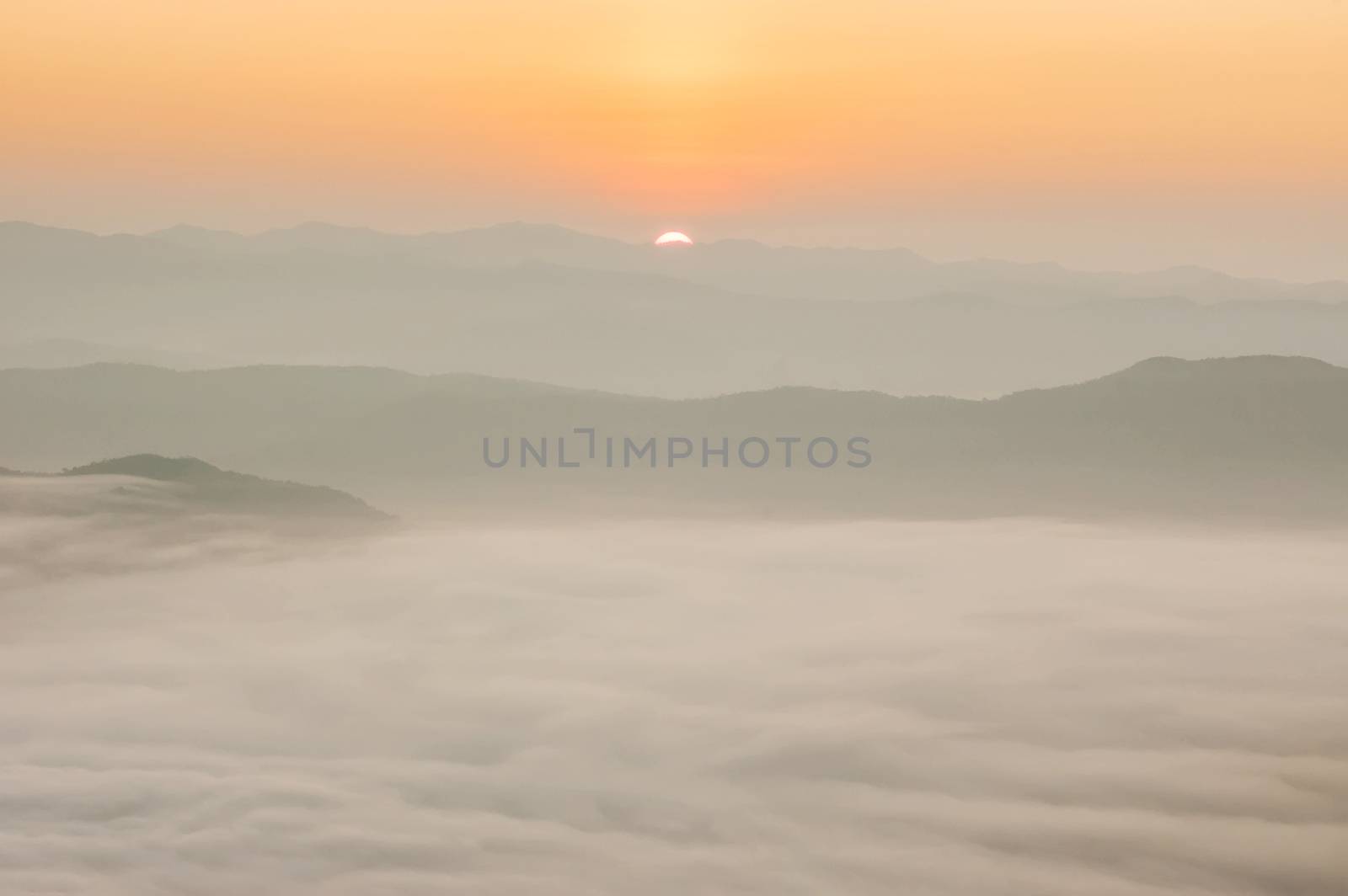 Beautiful morning with fog between hills at Doi Samer Dao in Si Nan National Park , High mountain in Nan province, Thailand