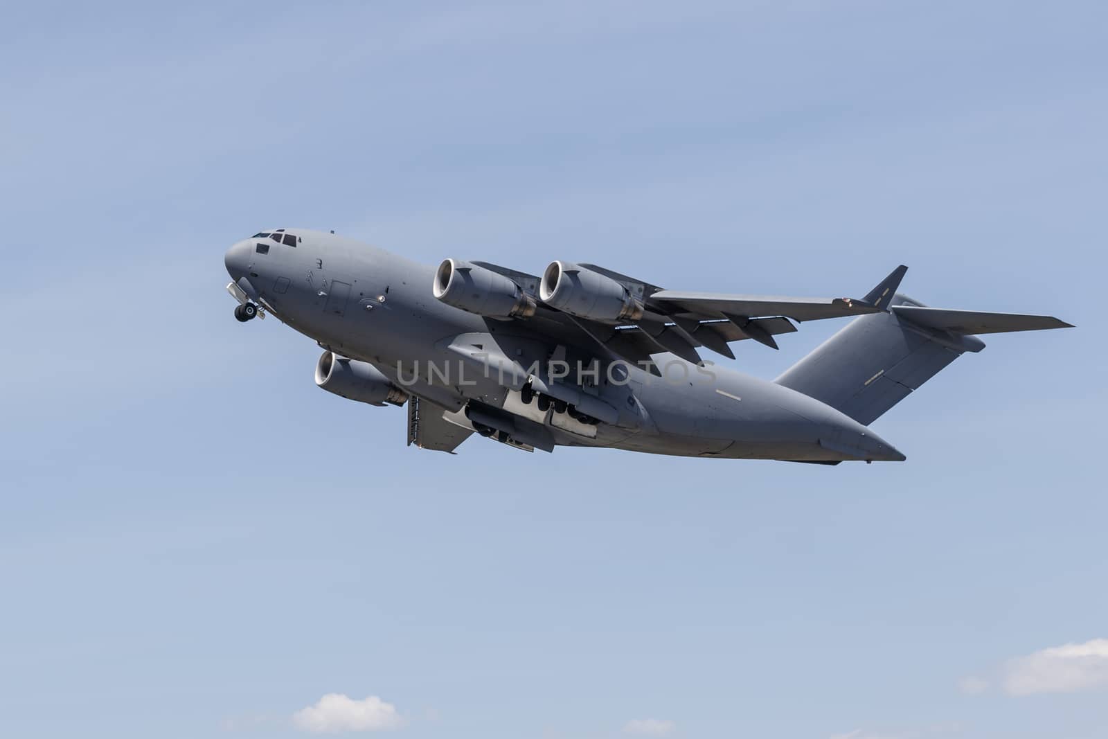 A C-17 Globemaster III heavy military transport plane in flight