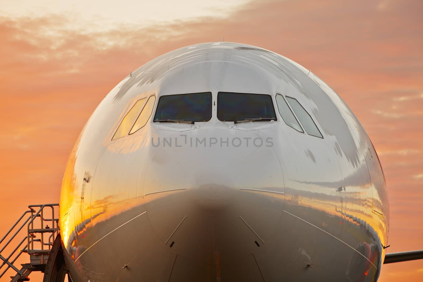 Airport  - large airplane at the sunrise