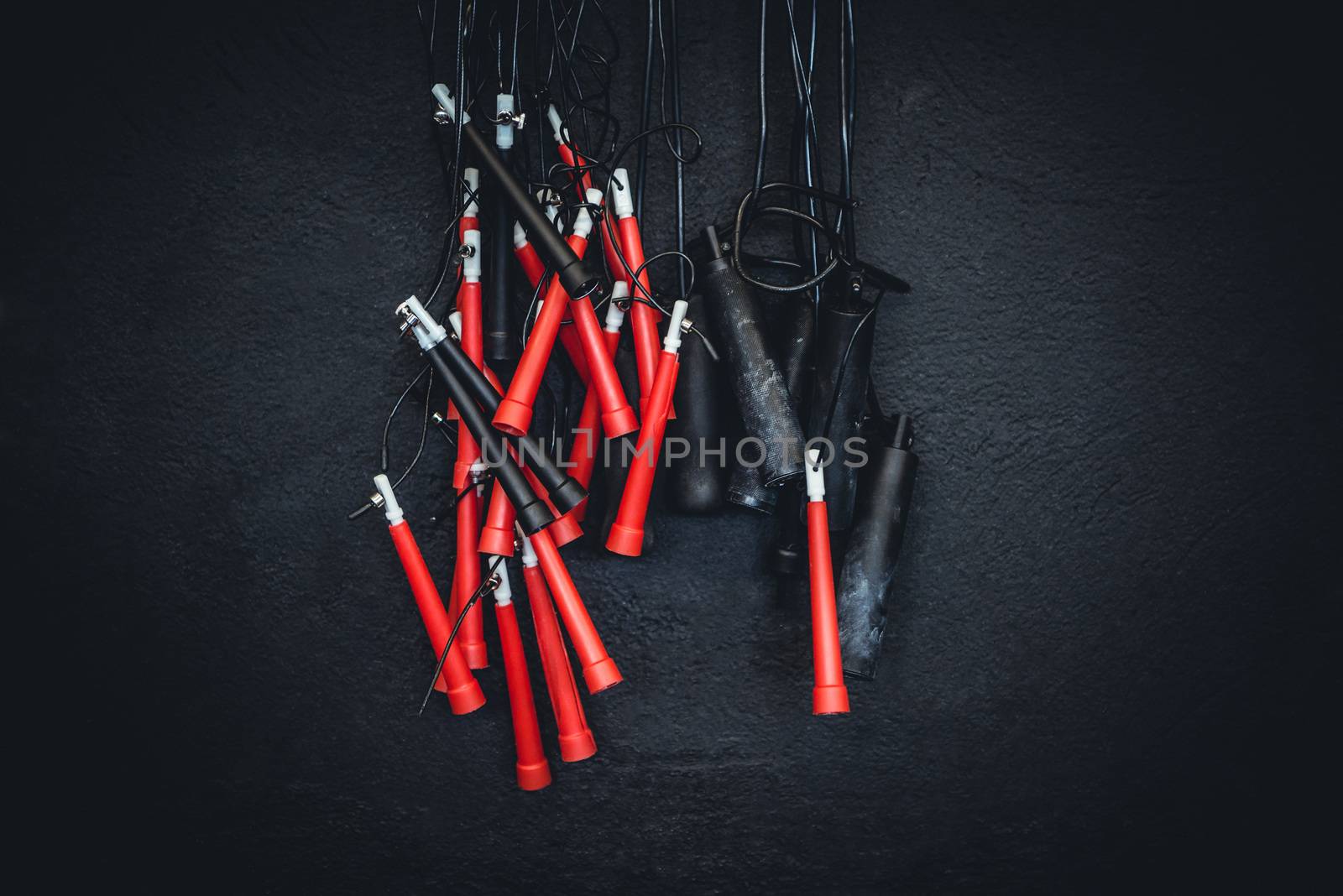 Detail shot of jump ropes at a gym.