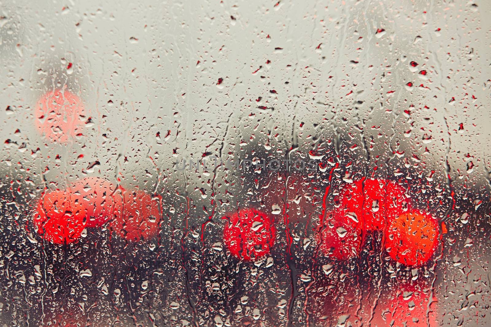 Raindrop on the window of the car by Chalabala