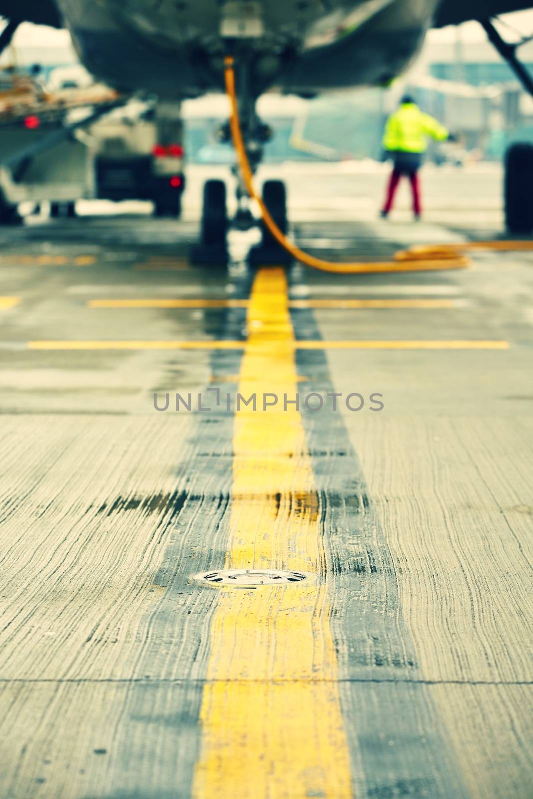 Airplane is parking at the airport - selective focus