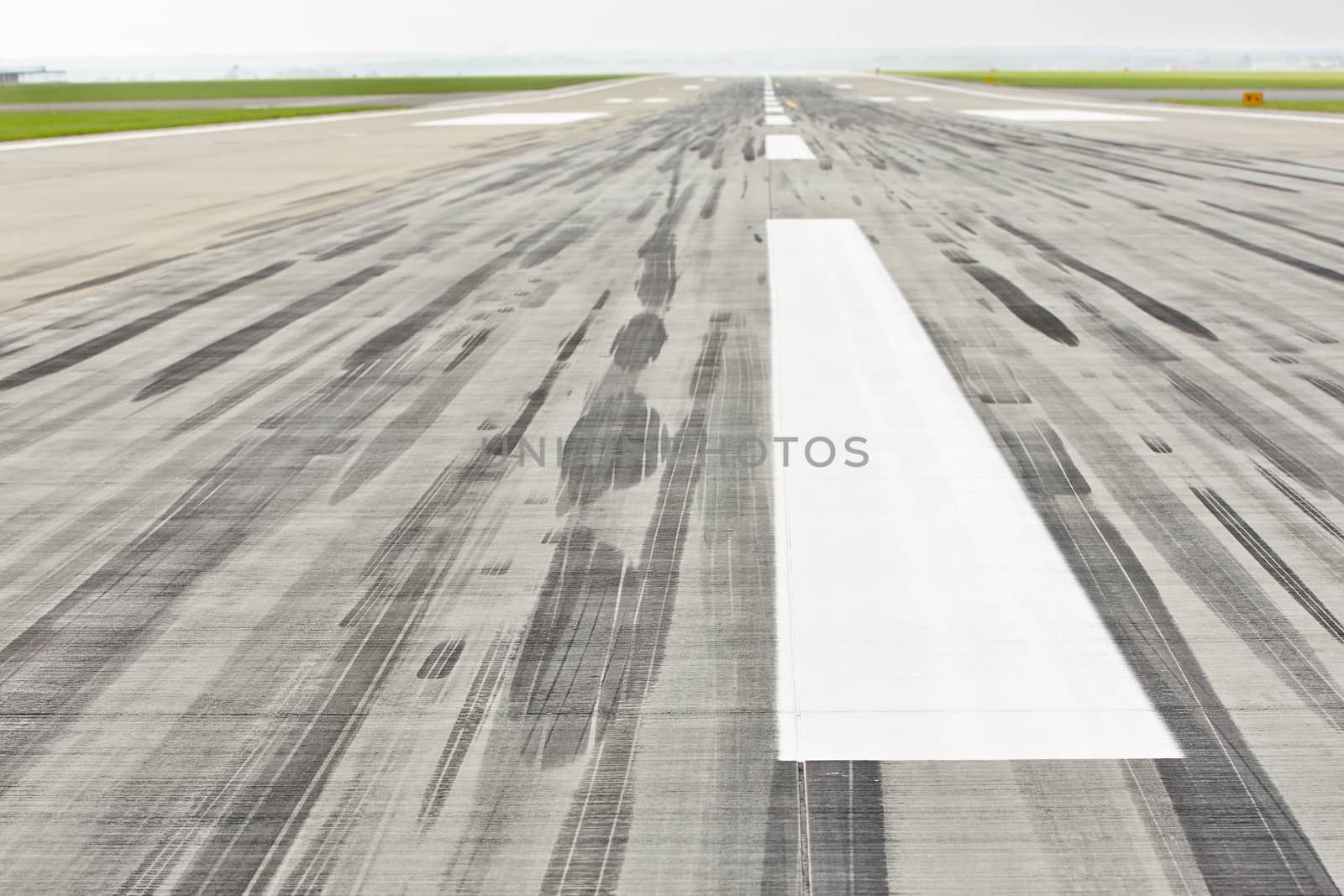 Airport - Striped line on the runway. 