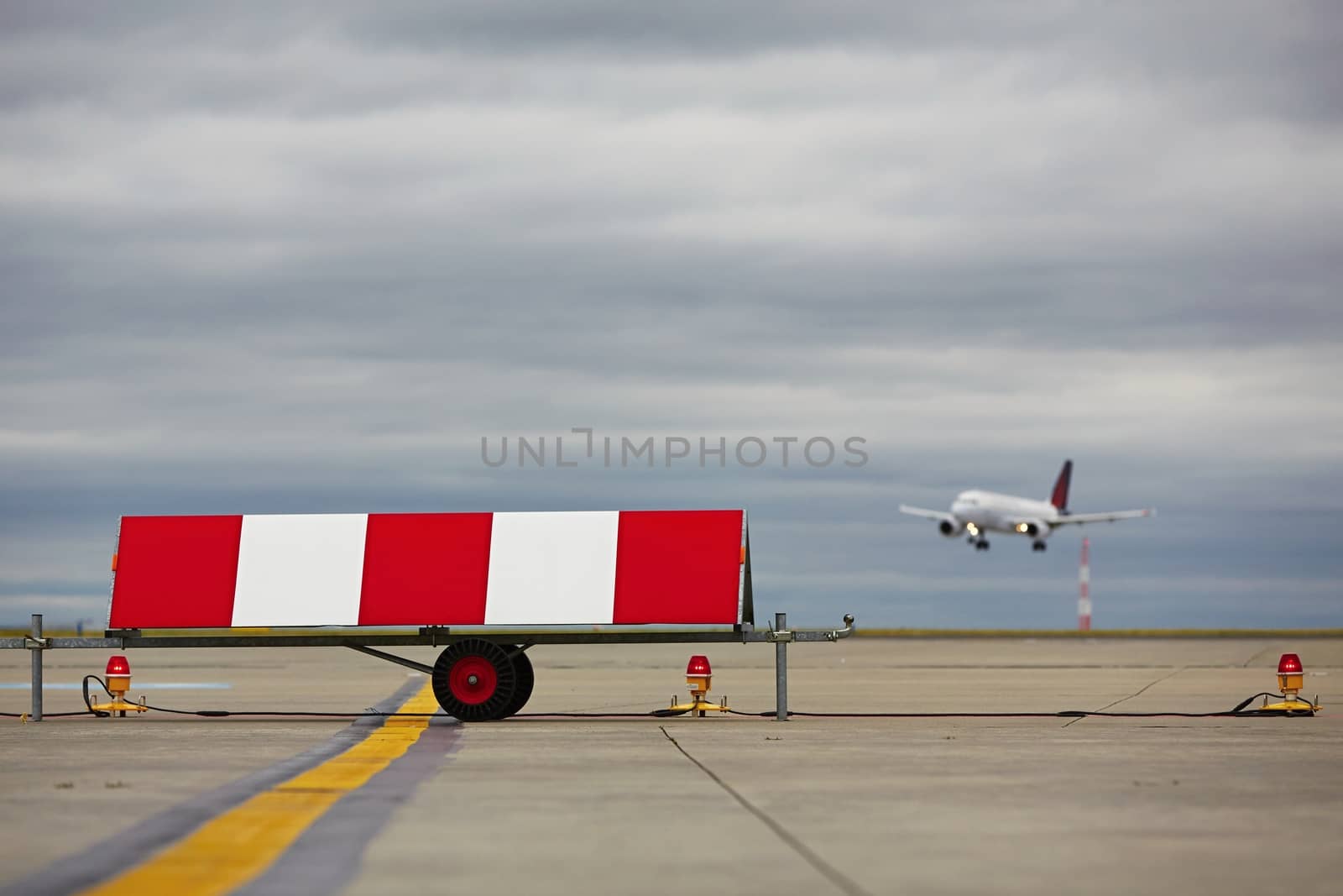 Airplane is landing at the airport - selective focus