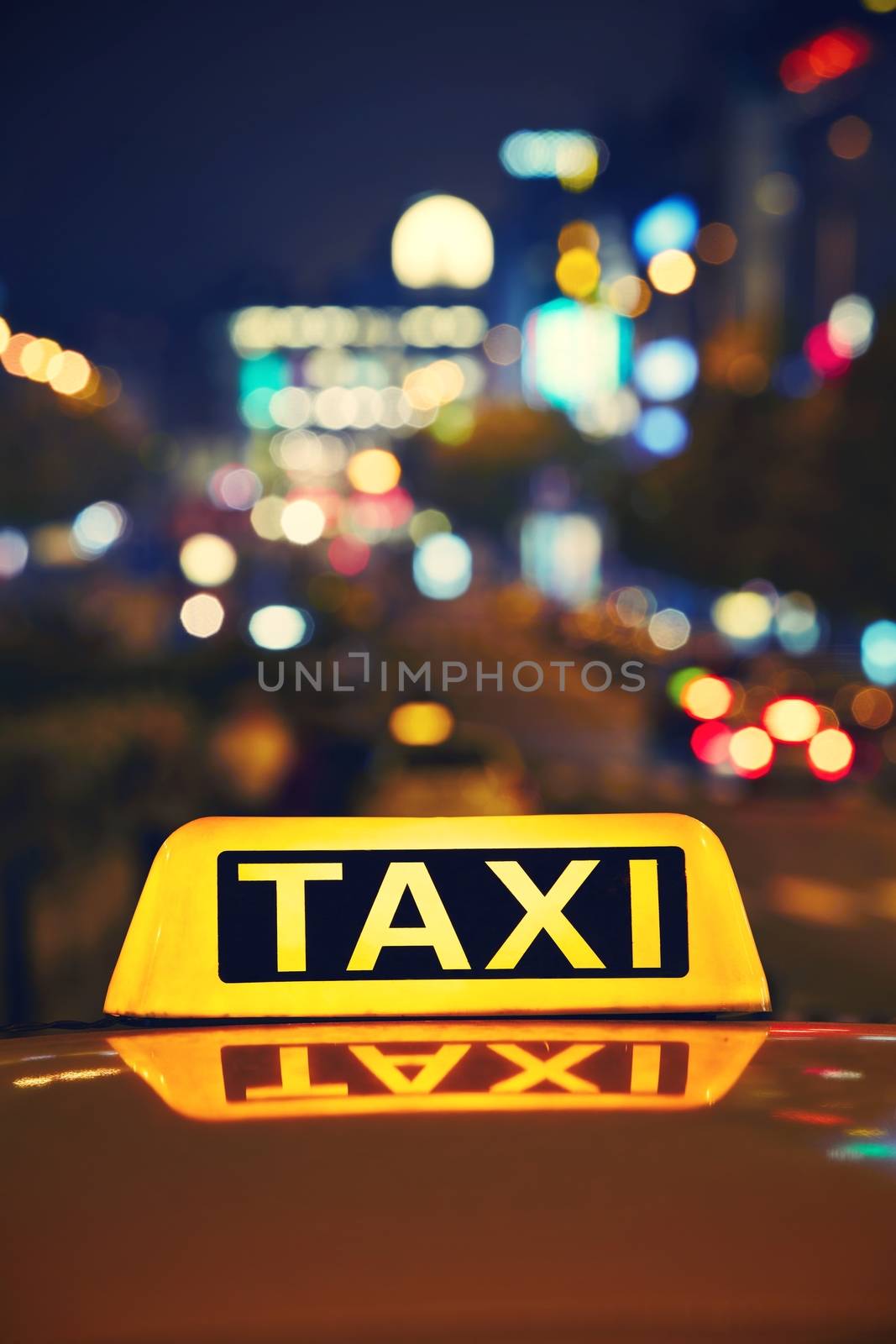 Taxi car on the street at night - Wenceslas Square, Prague