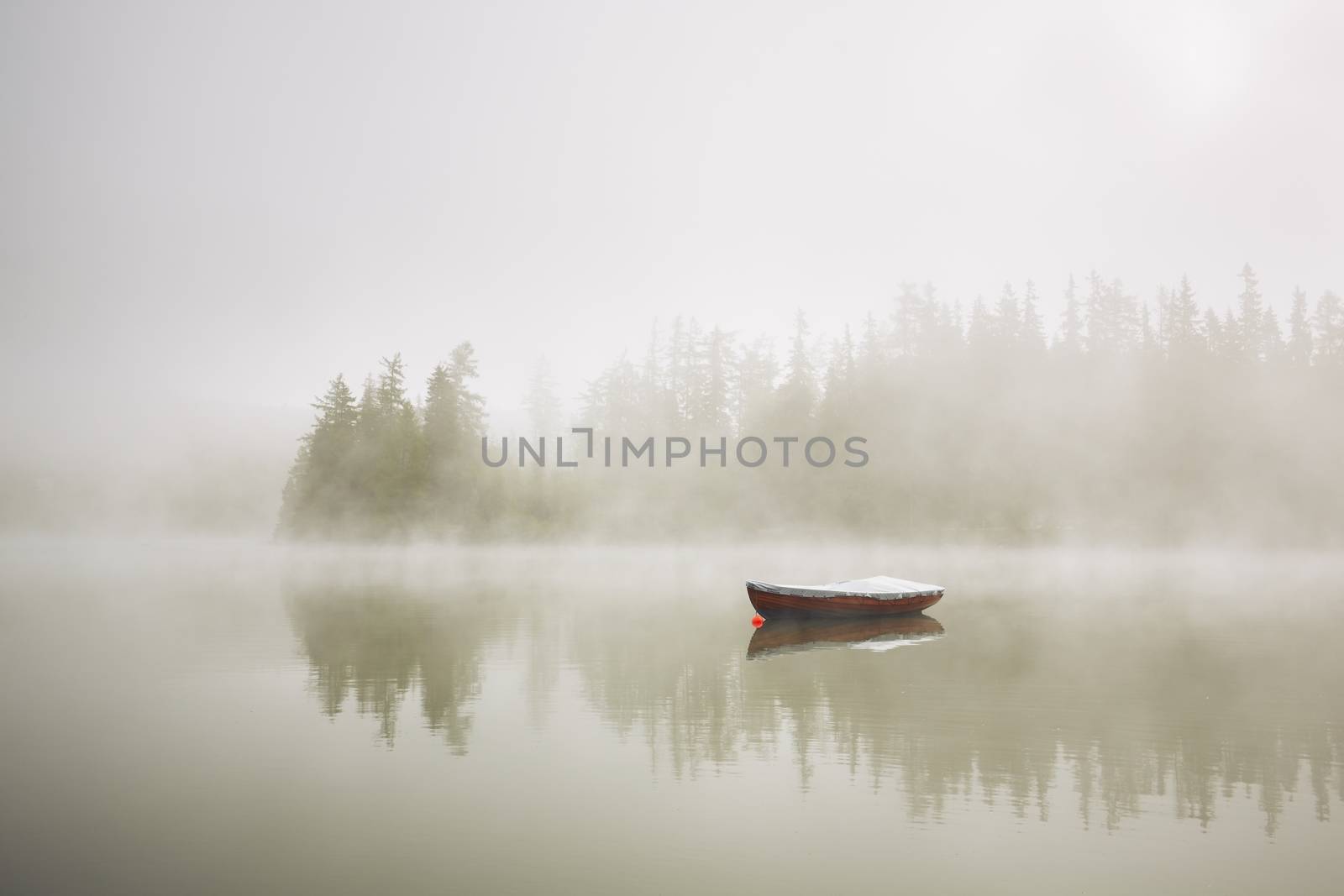 Boat in mysterious fog by Chalabala