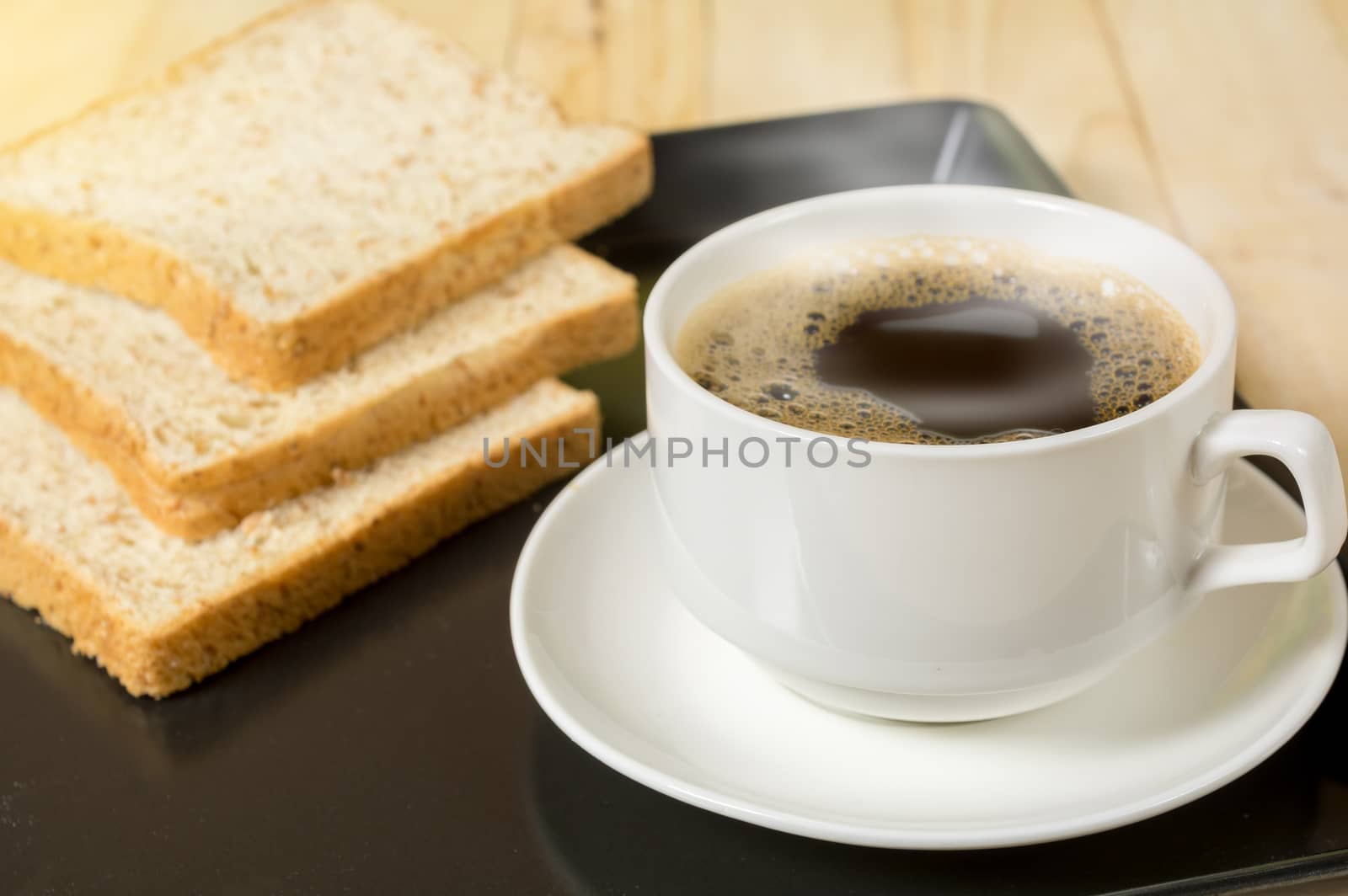 Cup of coffee with whole wheat