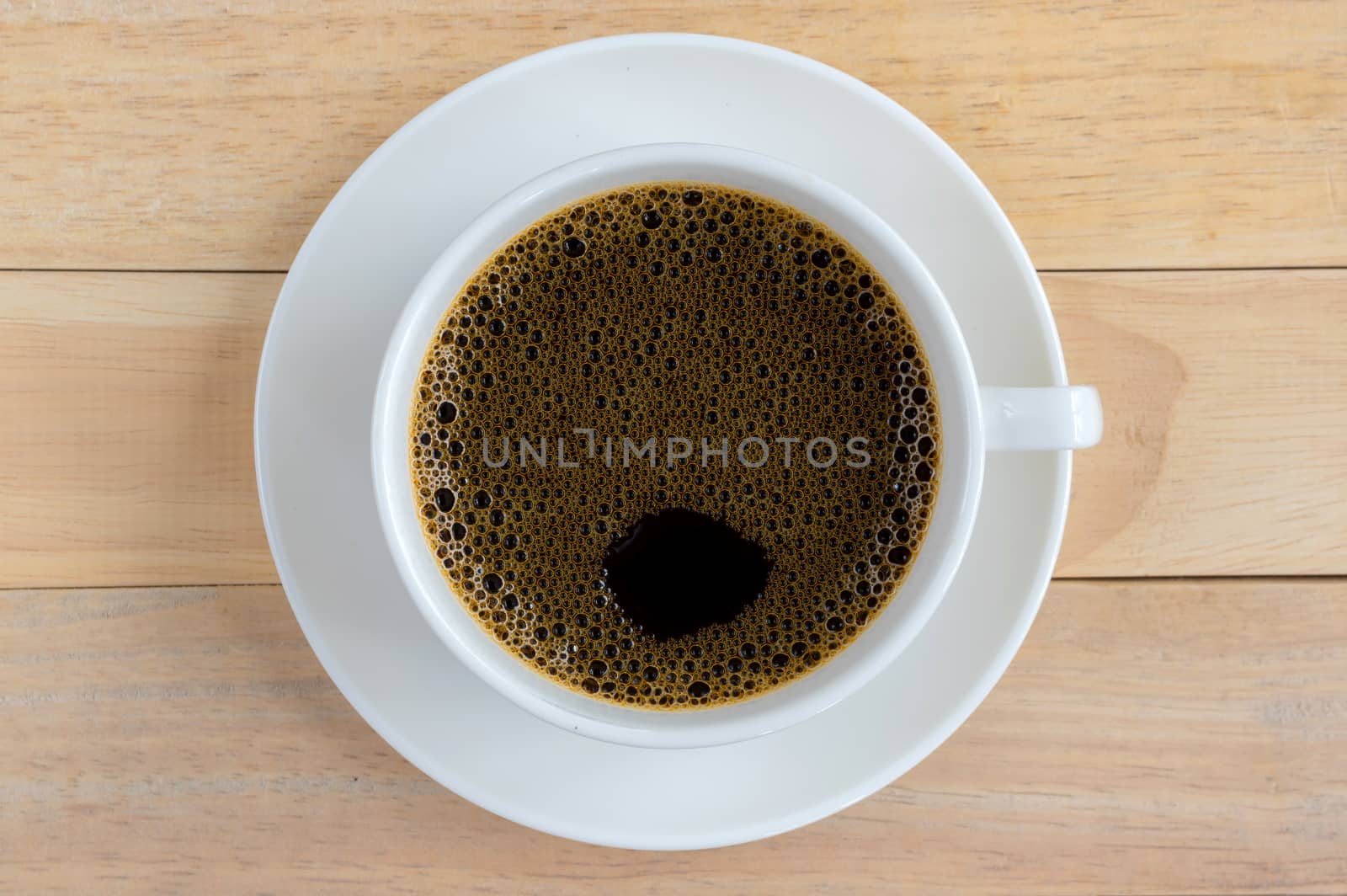 Cup of coffee on wood background. by seksan44