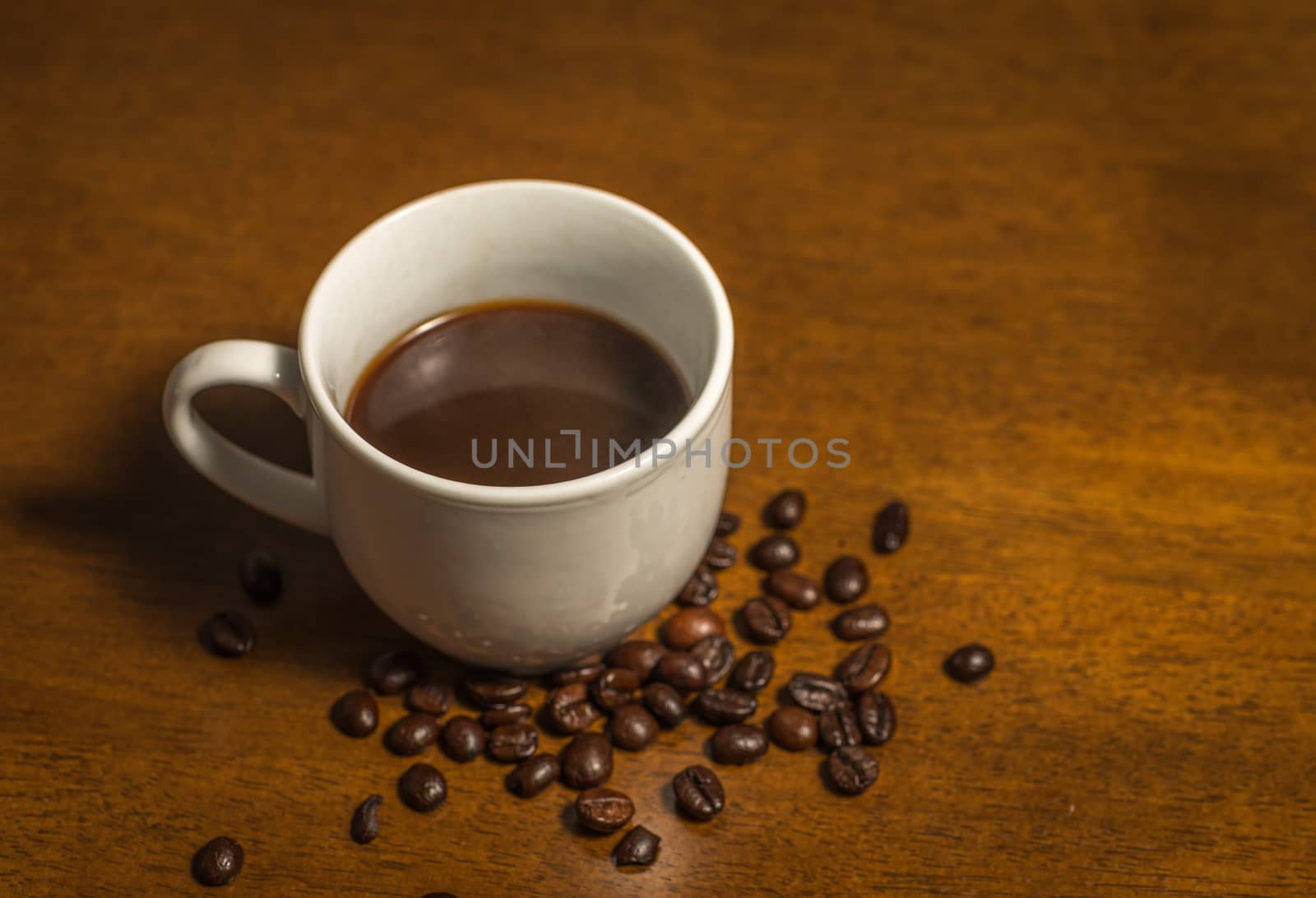 Cup of Espresso and coffee beans